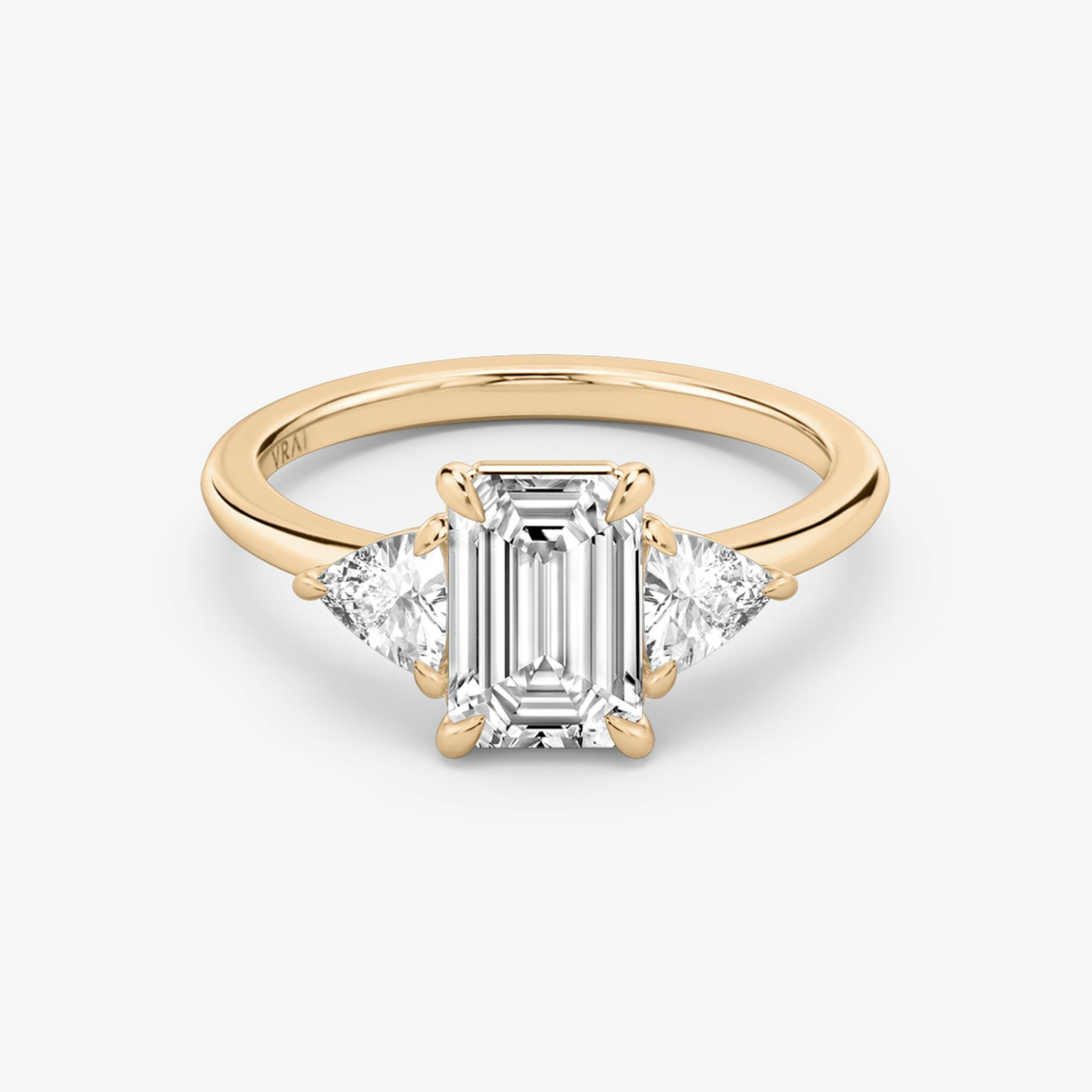 The Three Stone | Emerald | 14k | Rose Gold | bandAccent: Plain | sideStoneCarat: 0.25ct | sideStoneShape: Trillion | diamondOrientation: vertical | caratWeight: other