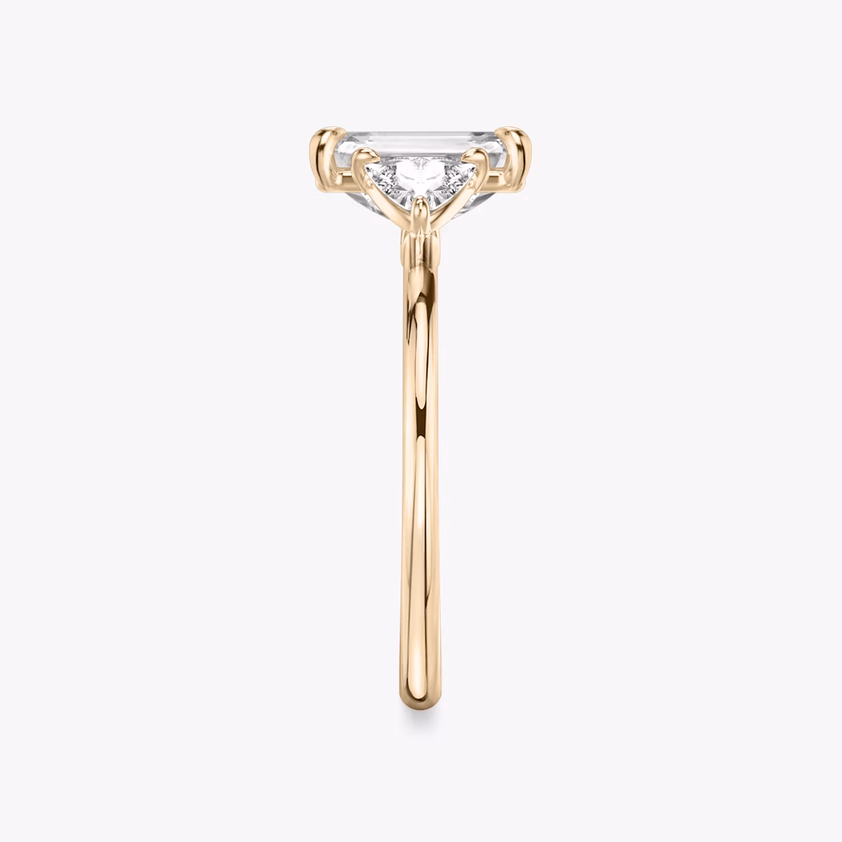The Three Stone | Emerald | 14k | Rose Gold | bandAccent: Plain | sideStoneCarat: 0.25ct | sideStoneShape: Trillion | diamondOrientation: vertical | caratWeight: other