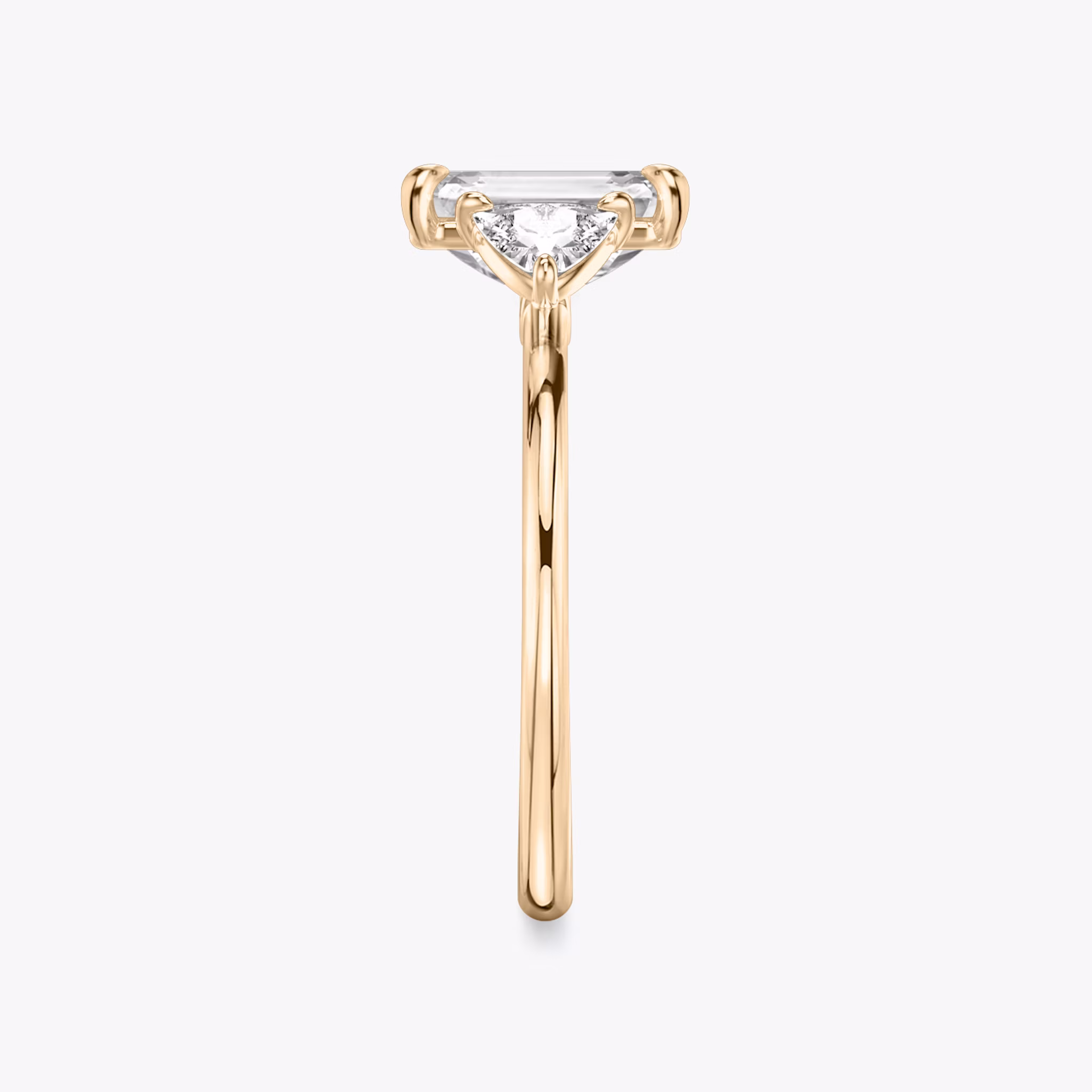 The Three Stone | Emerald | 14k | Rose Gold | bandAccent: Plain | sideStoneCarat: 0.25ct | sideStoneShape: Trillion | diamondOrientation: vertical | caratWeight: other