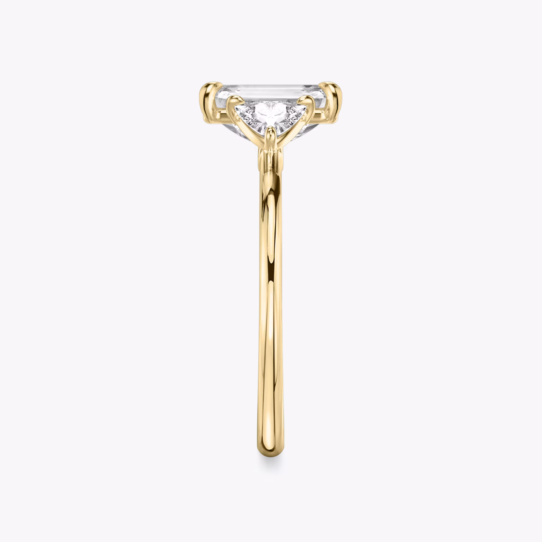 The Three Stone | Emerald | 18k | Yellow Gold | bandAccent: Plain | sideStoneCarat: 0.25ct | sideStoneShape: Trillion | diamondOrientation: vertical | caratWeight: other