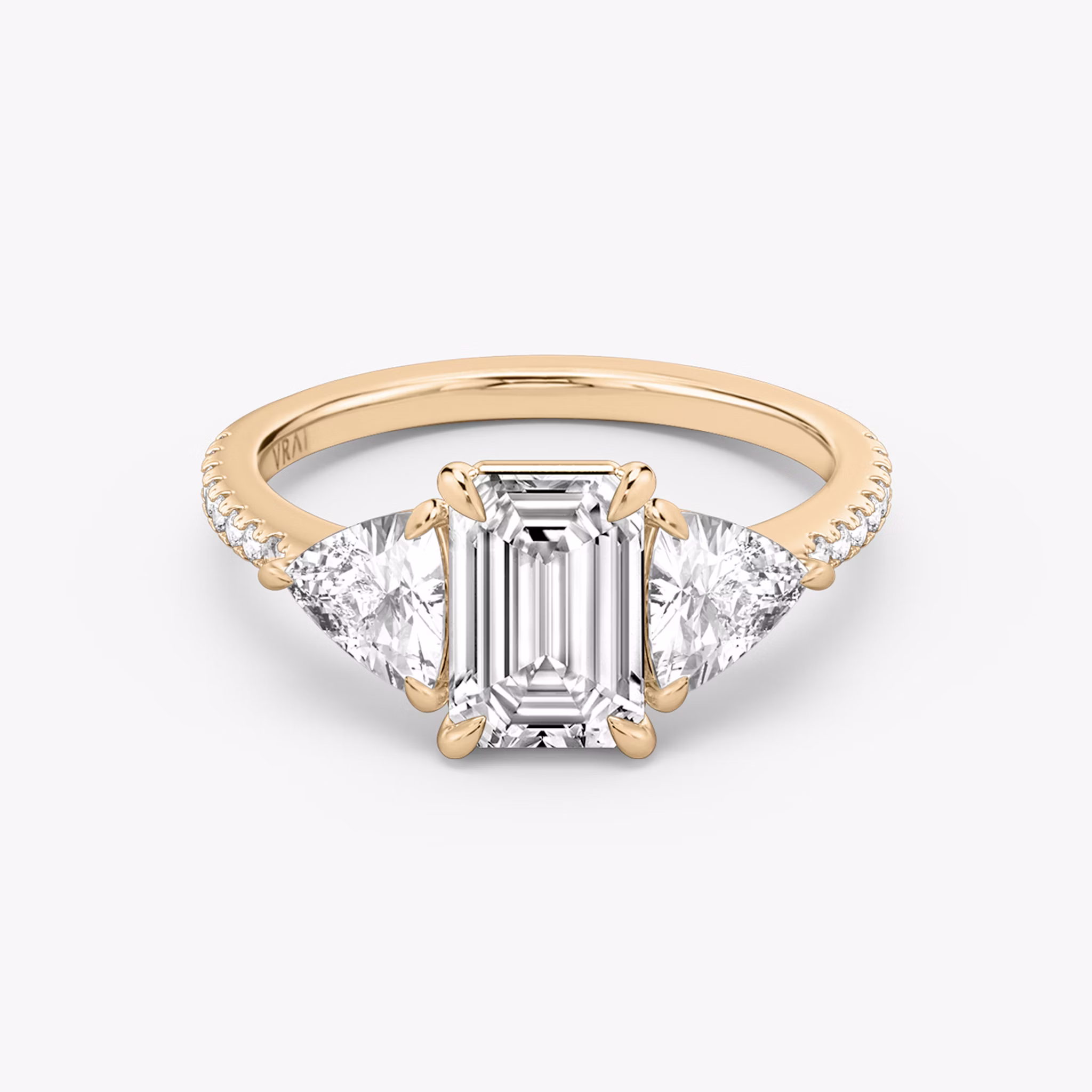 The Three Stone | Emerald | 14k | Rose Gold | bandAccent: Pavé | sideStoneCarat: 0.50ct | sideStoneShape: Trillion | diamondOrientation: vertical | caratWeight: other