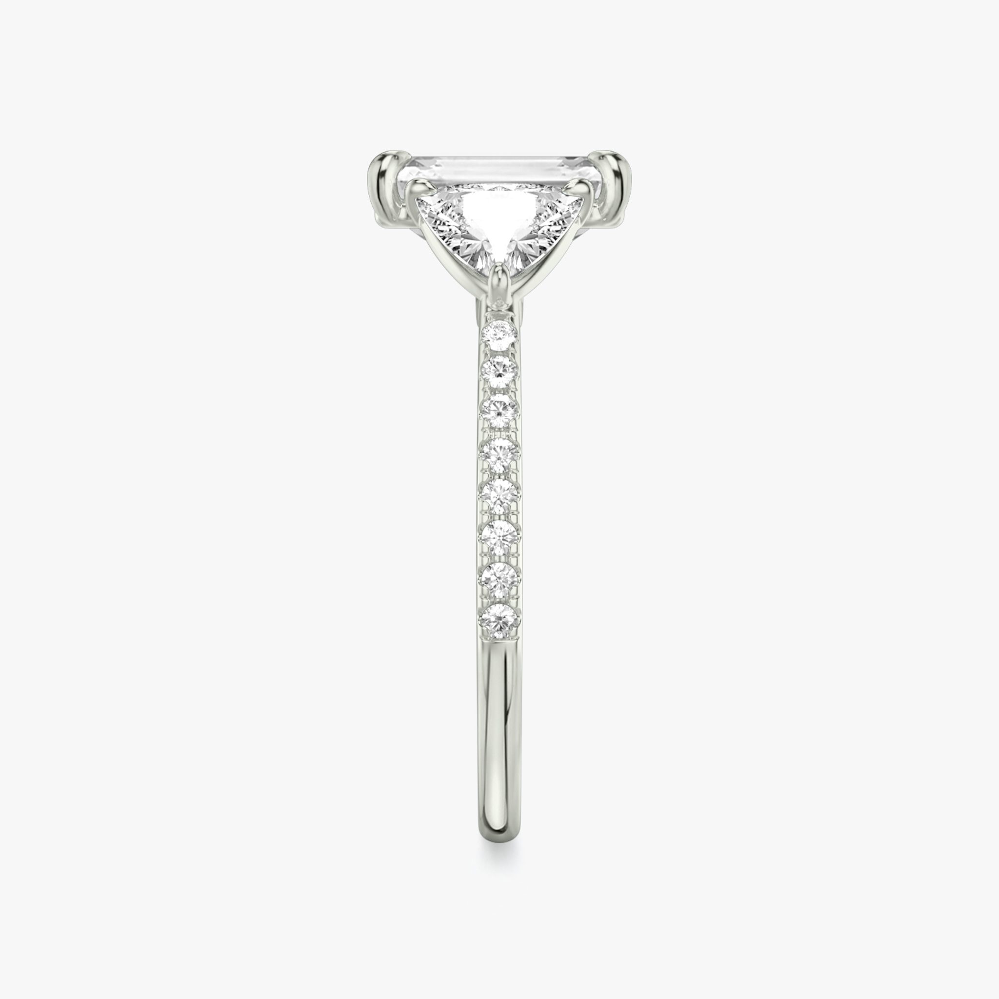 The Three Stone | Emerald | 18k | White Gold | bandAccent: Pavé | sideStoneCarat: 0.50ct | sideStoneShape: Trillion | diamondOrientation: vertical | caratWeight: other