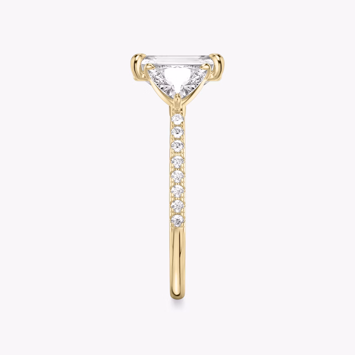 The Three Stone | Emerald | 18k | Yellow Gold | bandAccent: Pavé | sideStoneCarat: 0.50ct | sideStoneShape: Trillion | diamondOrientation: vertical | caratWeight: other