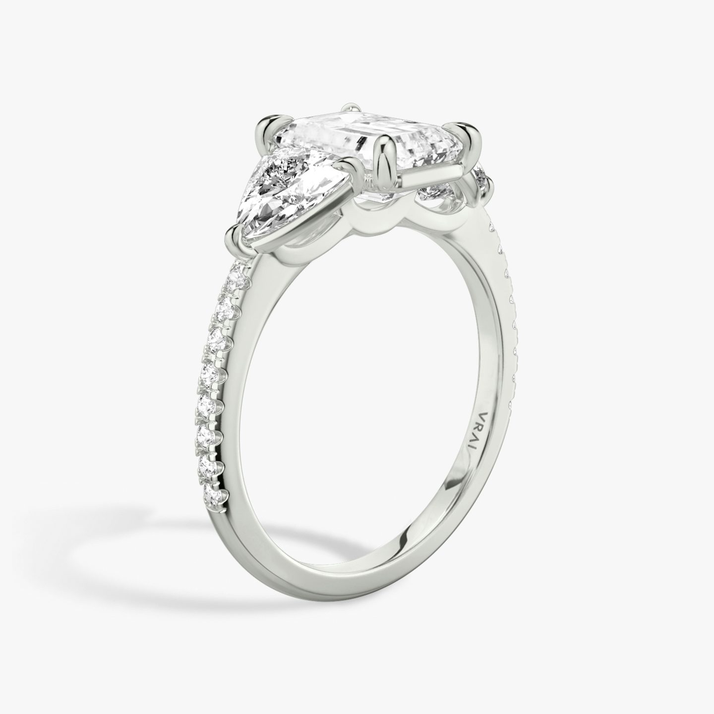 The Three Stone | Emerald | 18k | White Gold | bandAccent: Pavé | sideStoneCarat: 0.50ct | sideStoneShape: Trillion | diamondOrientation: vertical | caratWeight: other
