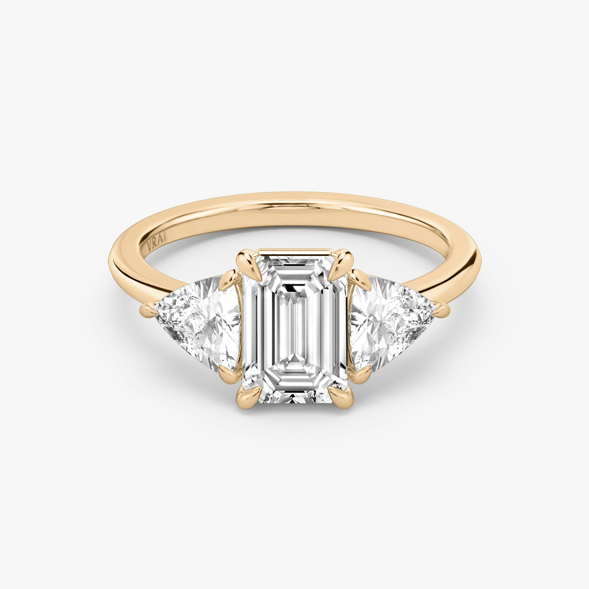 The Three Stone | Emerald | 14k | Rose Gold | bandAccent: Plain | sideStoneCarat: 0.50ct | sideStoneShape: Trillion | diamondOrientation: vertical | caratWeight: other