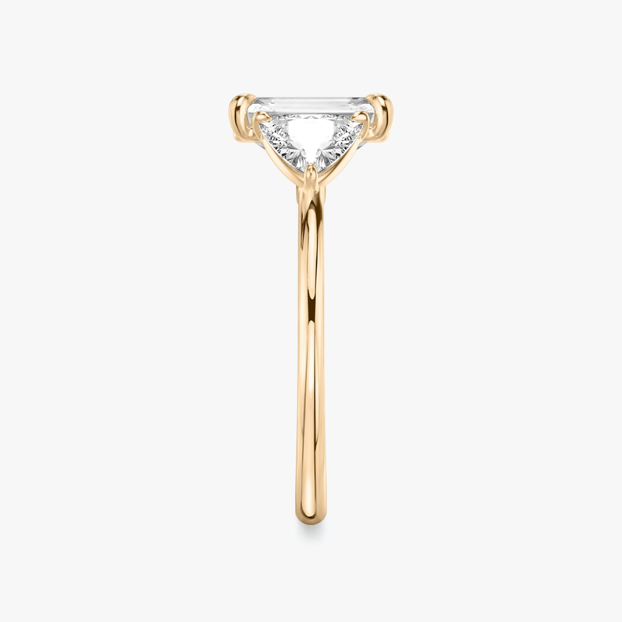 The Three Stone | Emerald | 14k | Rose Gold | bandAccent: Plain | sideStoneCarat: 0.50ct | sideStoneShape: Trillion | diamondOrientation: vertical | caratWeight: other