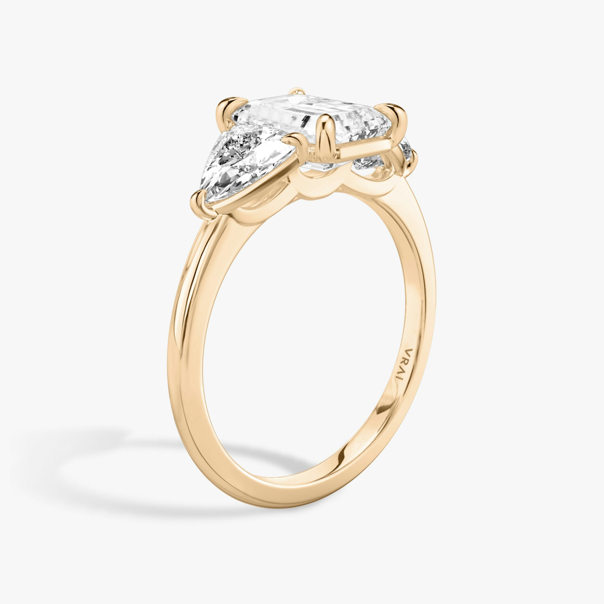 The Three Stone | Emerald | 14k | Rose Gold | bandAccent: Plain | sideStoneCarat: 0.50ct | sideStoneShape: Trillion | diamondOrientation: vertical | caratWeight: other