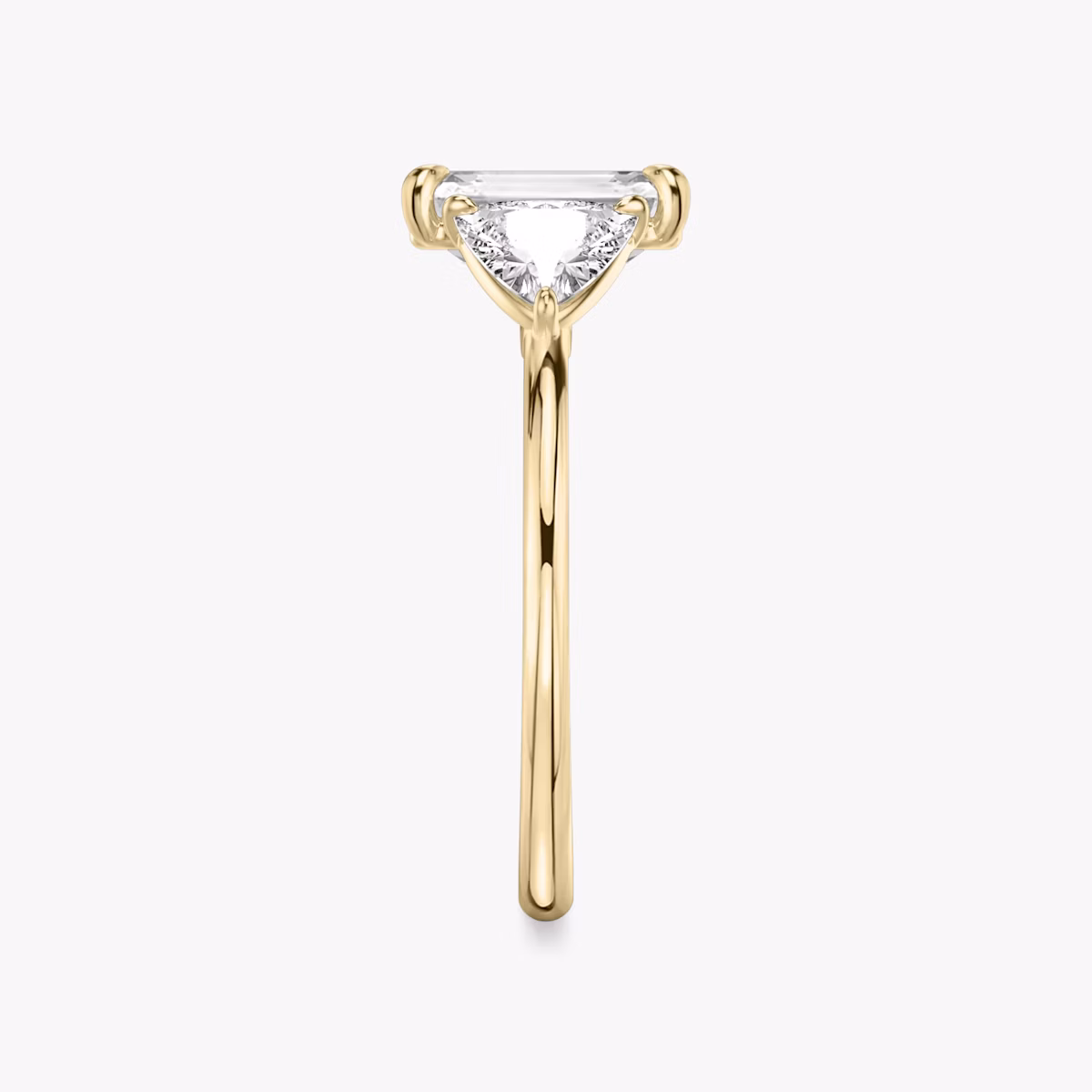The Three Stone | Emerald | 18k | Yellow Gold | bandAccent: Plain | sideStoneCarat: 0.50ct | sideStoneShape: Trillion | diamondOrientation: vertical | caratWeight: other