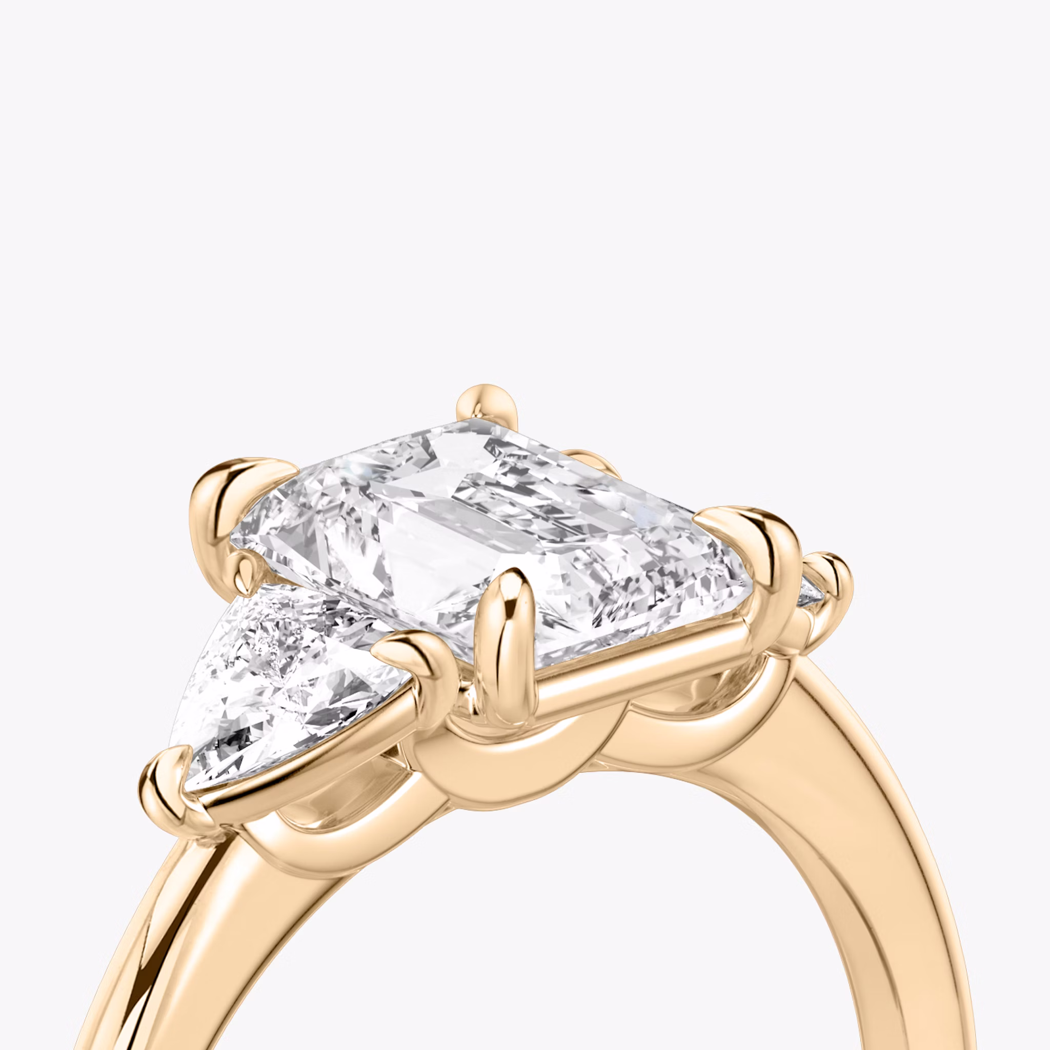 The Three Stone | Radiant | 14k | Rose Gold | bandAccent: Plain | sideStoneCarat: 0.25ct | sideStoneShape: Trillion | diamondOrientation: vertical | caratWeight: other
