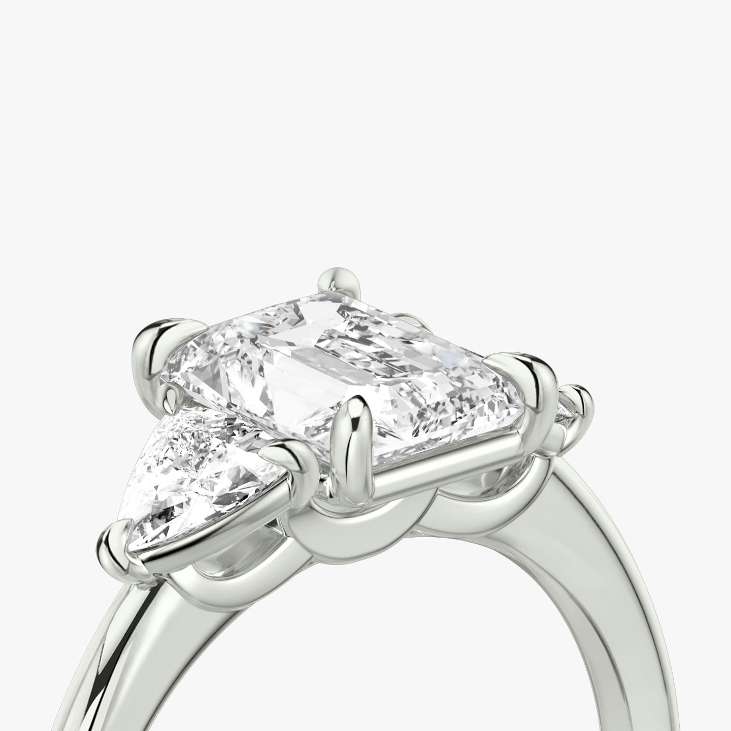 The Three Stone | Radiant | Platinum | bandAccent: Plain | sideStoneCarat: 0.25ct | sideStoneShape: Trillion | diamondOrientation: vertical | caratWeight: other