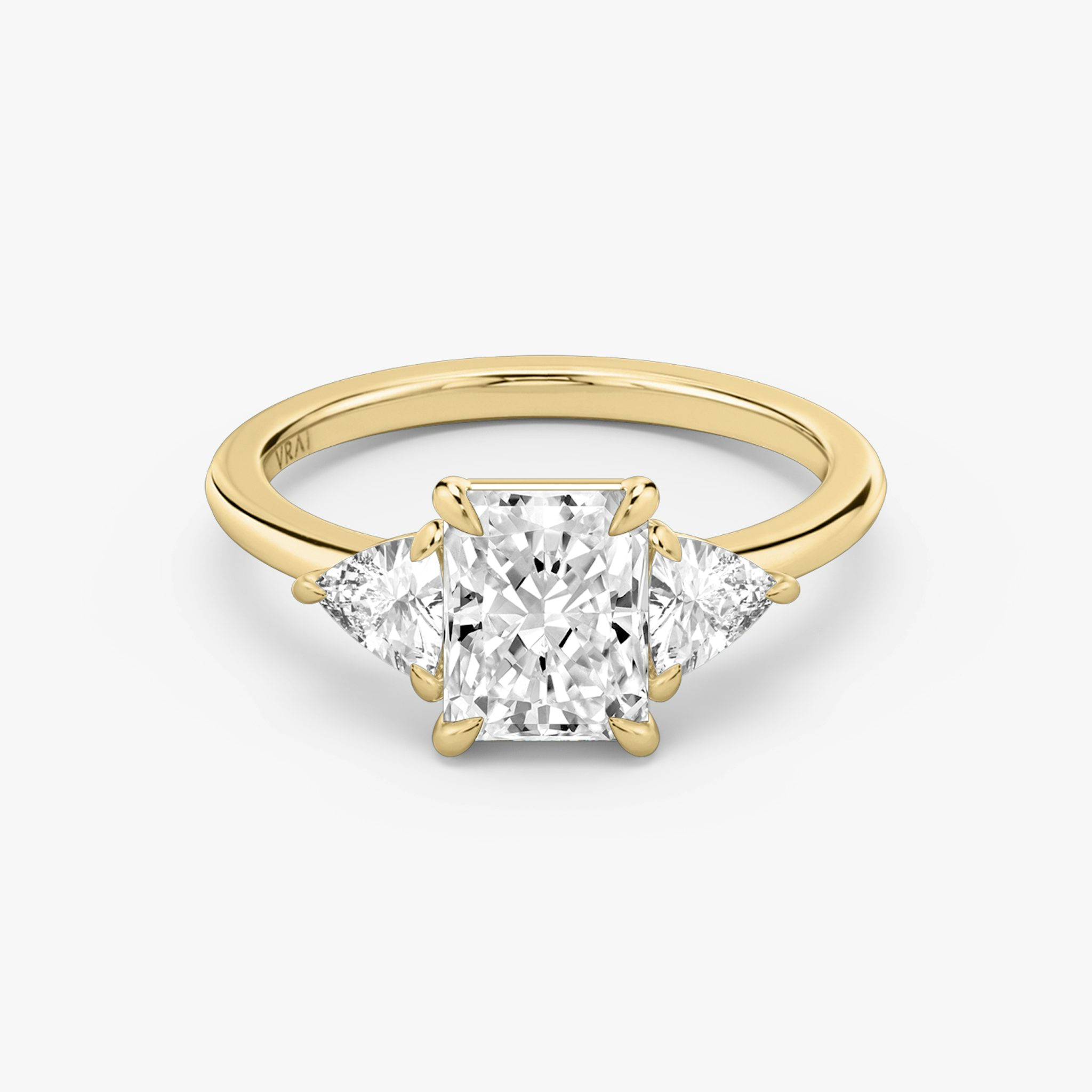 The Three Stone | Radiant | 18k | Yellow Gold | bandAccent: Plain | sideStoneCarat: 0.25ct | sideStoneShape: Trillion | diamondOrientation: vertical | caratWeight: other