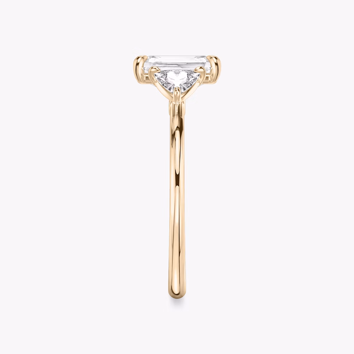The Three Stone | Radiant | 14k | Rose Gold | bandAccent: Plain | sideStoneCarat: 0.25ct | sideStoneShape: Trillion | diamondOrientation: vertical | caratWeight: other
