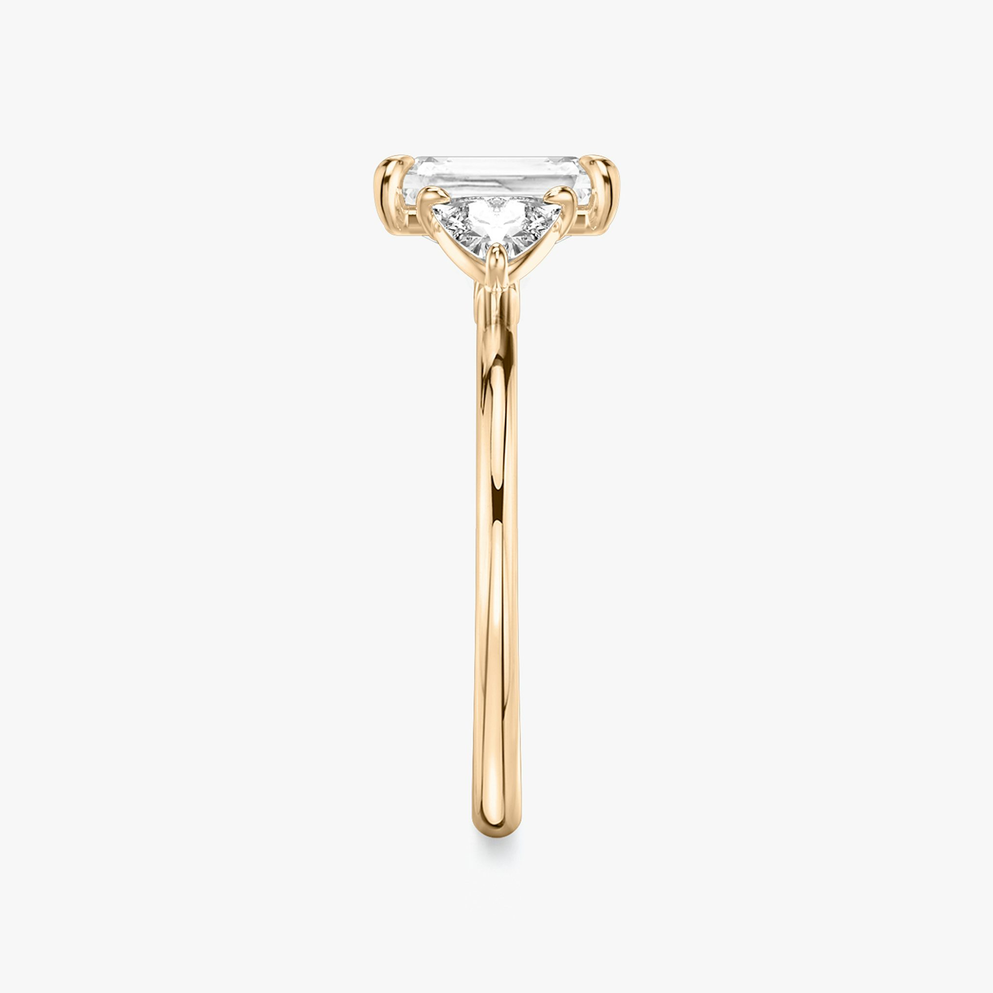 The Three Stone | Radiant | 14k | Rose Gold | bandAccent: Plain | sideStoneCarat: 0.25ct | sideStoneShape: Trillion | diamondOrientation: vertical | caratWeight: other