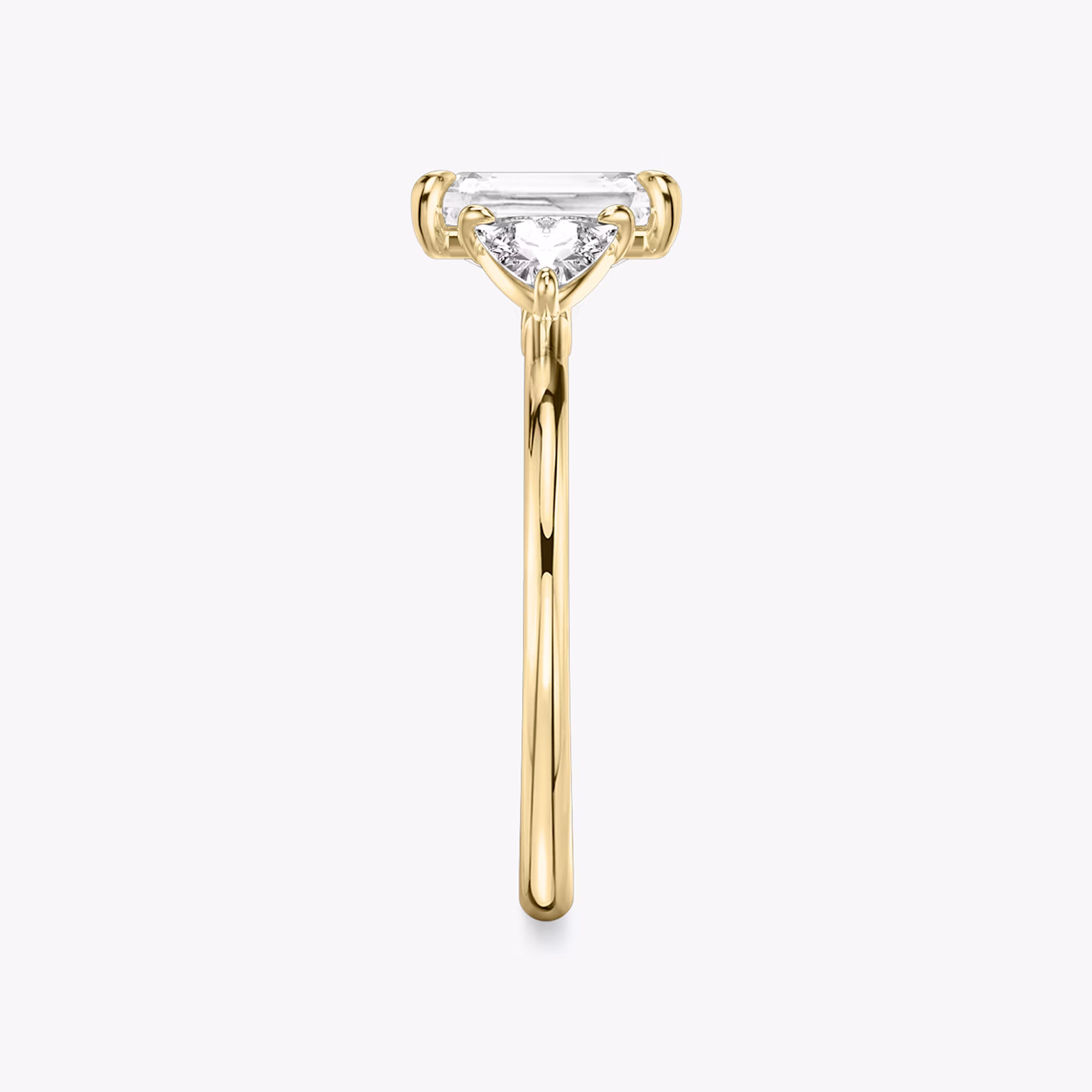 The Three Stone | Radiant | 18k | Yellow Gold | bandAccent: Plain | sideStoneCarat: 0.25ct | sideStoneShape: Trillion | diamondOrientation: vertical | caratWeight: other