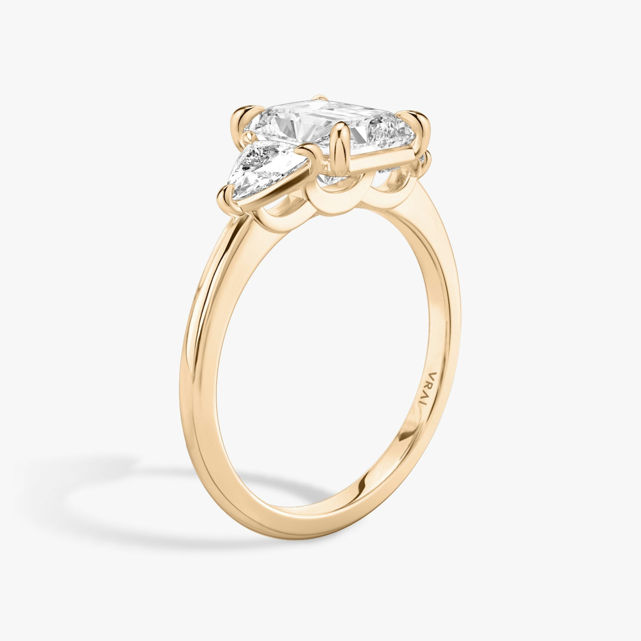 The Three Stone | Radiant | 14k | Rose Gold | bandAccent: Plain | sideStoneCarat: 0.25ct | sideStoneShape: Trillion | diamondOrientation: vertical | caratWeight: other