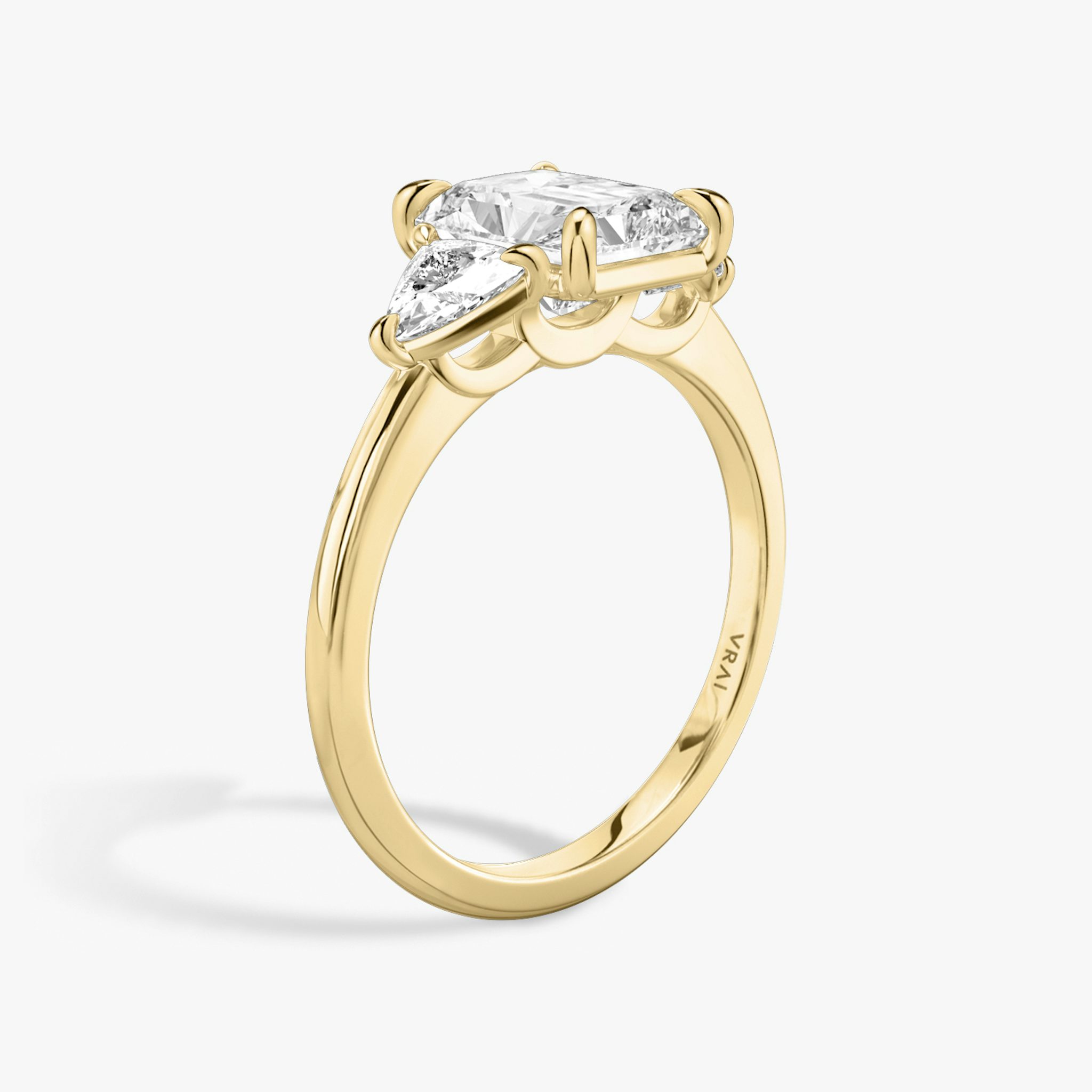The Three Stone | Radiant | 18k | Yellow Gold | bandAccent: Plain | sideStoneCarat: 0.25ct | sideStoneShape: Trillion | diamondOrientation: vertical | caratWeight: other