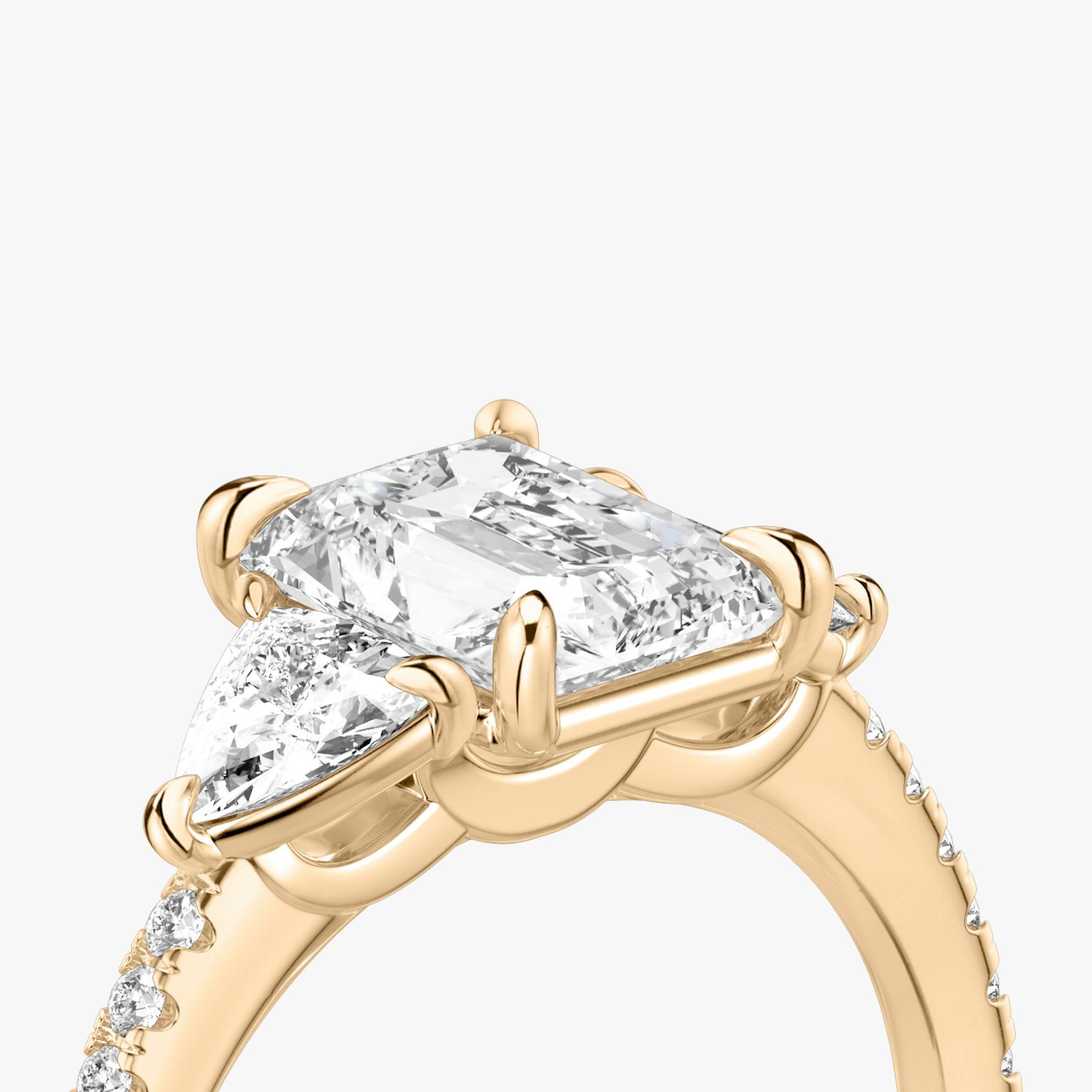 The Three Stone | Radiant | 14k | Rose Gold | bandAccent: Pavé | sideStoneCarat: 0.25ct | sideStoneShape: Trillion | diamondOrientation: vertical | caratWeight: other