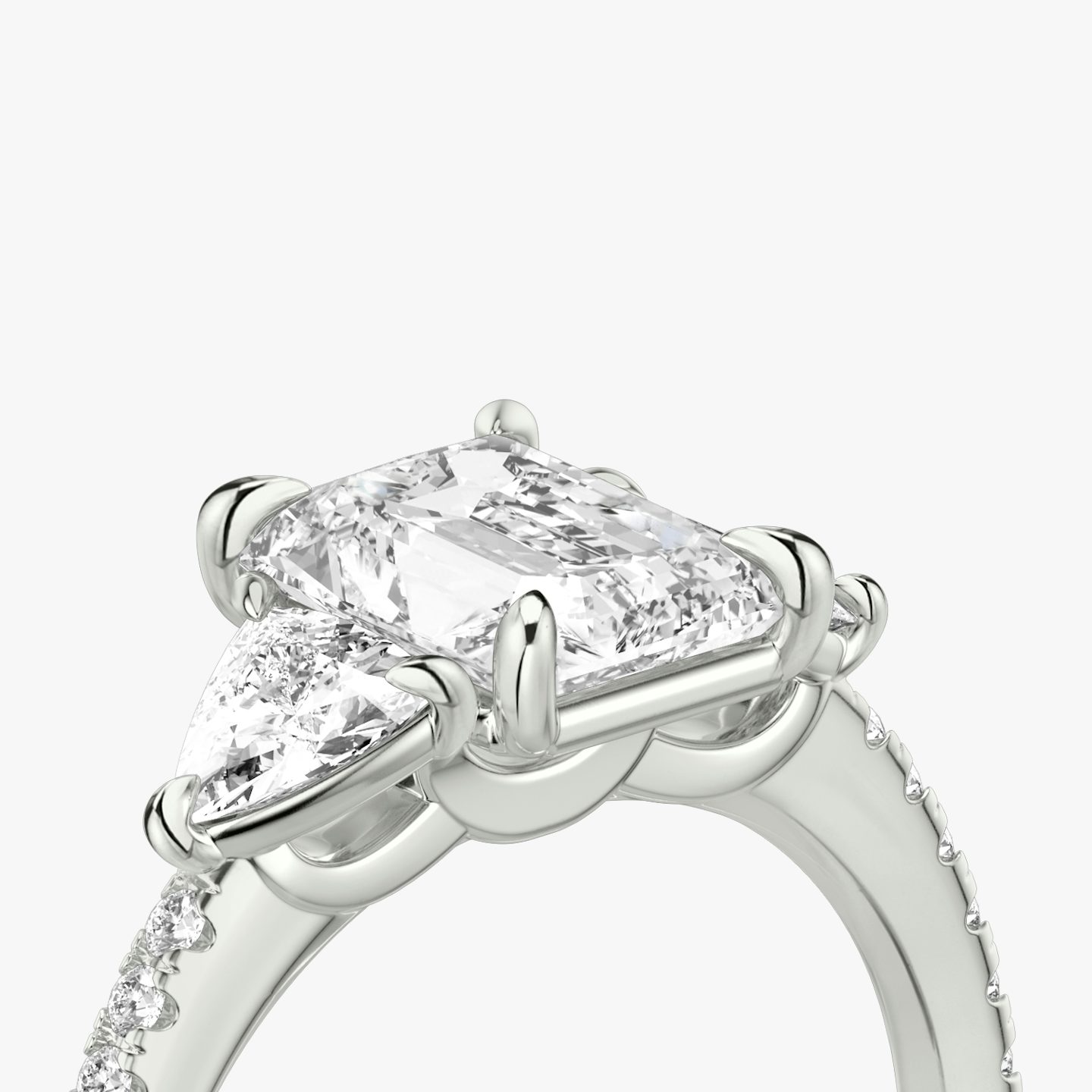 The Three Stone | Radiant | 18k | White Gold | bandAccent: Pavé | sideStoneCarat: 0.25ct | sideStoneShape: Trillion | diamondOrientation: vertical | caratWeight: other