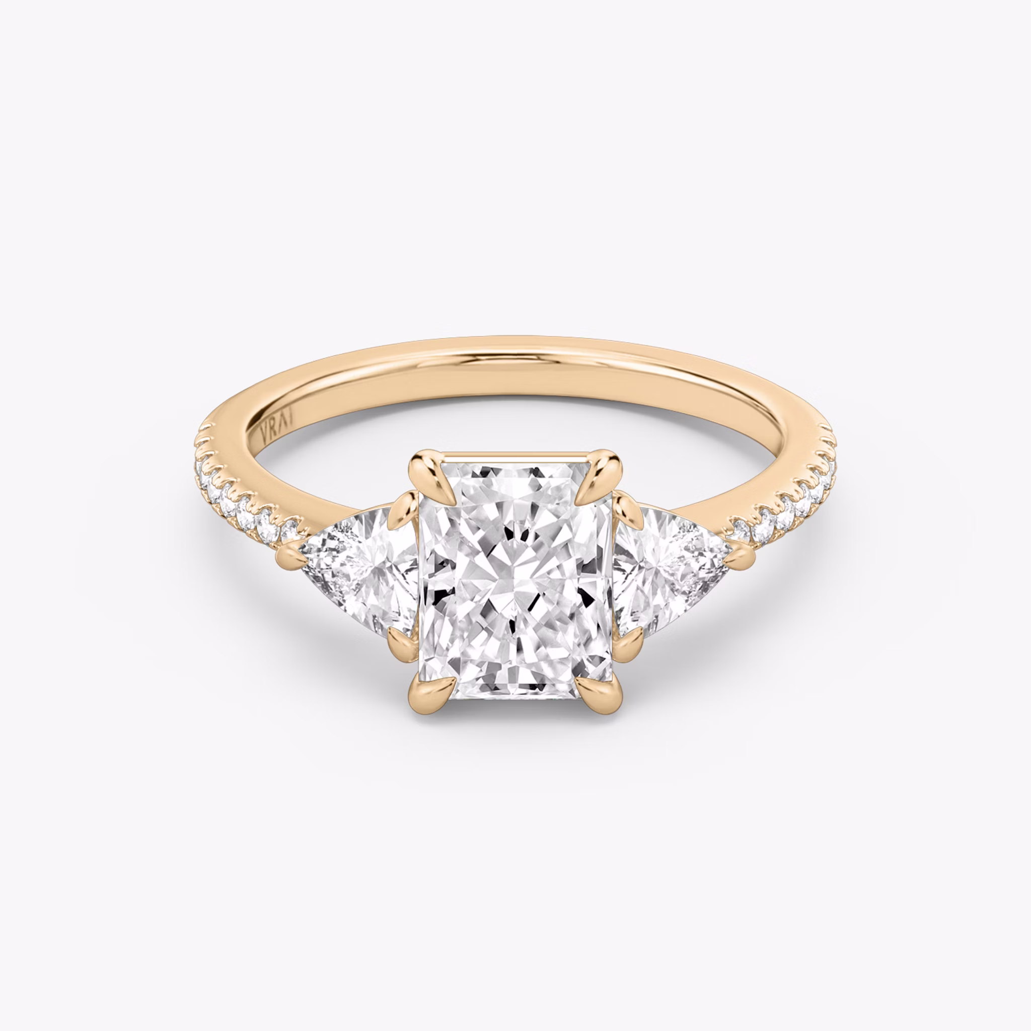 The Three Stone | Radiant | 14k | Rose Gold | bandAccent: Pavé | sideStoneCarat: 0.25ct | sideStoneShape: Trillion | diamondOrientation: vertical | caratWeight: other