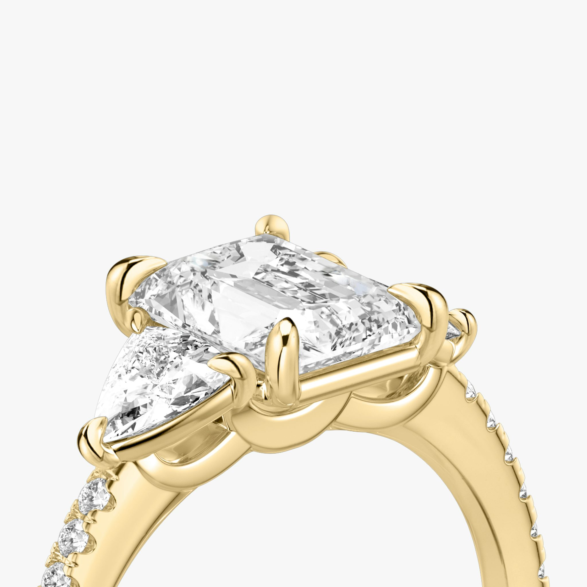 The Three Stone | Radiant | 18k | Yellow Gold | bandAccent: Pavé | sideStoneCarat: 0.25ct | sideStoneShape: Trillion | diamondOrientation: vertical | caratWeight: other