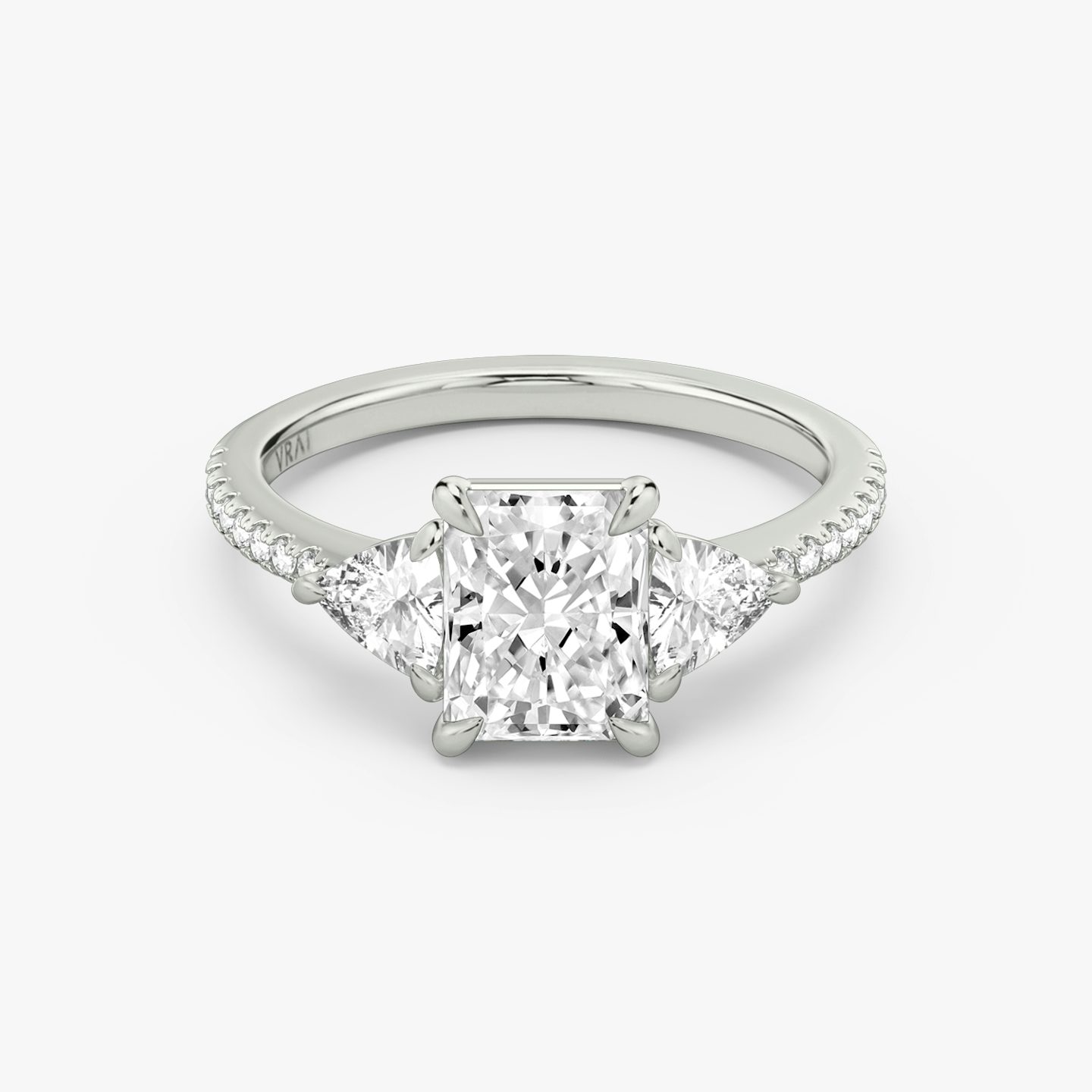 The Three Stone | Radiant | 18k | White Gold | bandAccent: Pavé | sideStoneCarat: 0.25ct | sideStoneShape: Trillion | diamondOrientation: vertical | caratWeight: other