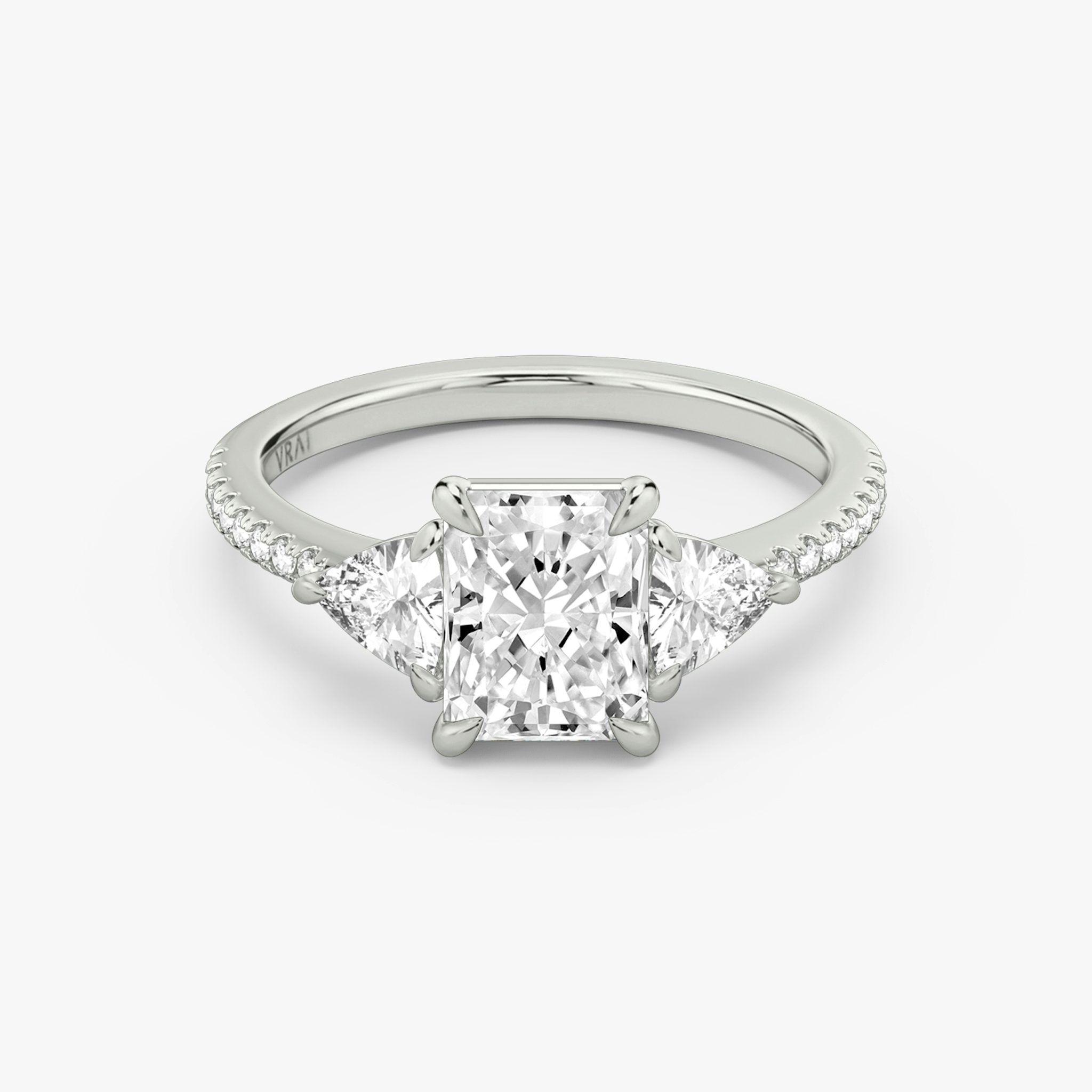 The Three Stone | Radiant | Platinum | bandAccent: Pavé | sideStoneCarat: 0.25ct | sideStoneShape: Trillion | diamondOrientation: vertical | caratWeight: other
