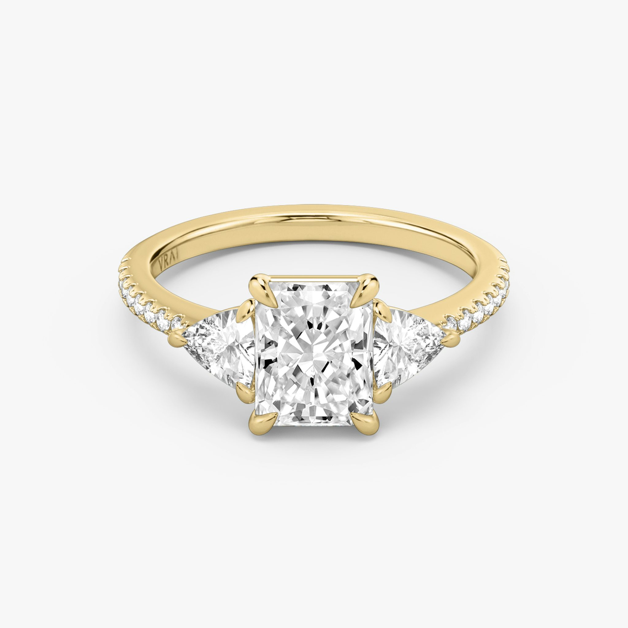 The Three Stone | Radiant | 18k | Yellow Gold | bandAccent: Pavé | sideStoneCarat: 0.25ct | sideStoneShape: Trillion | diamondOrientation: vertical | caratWeight: other