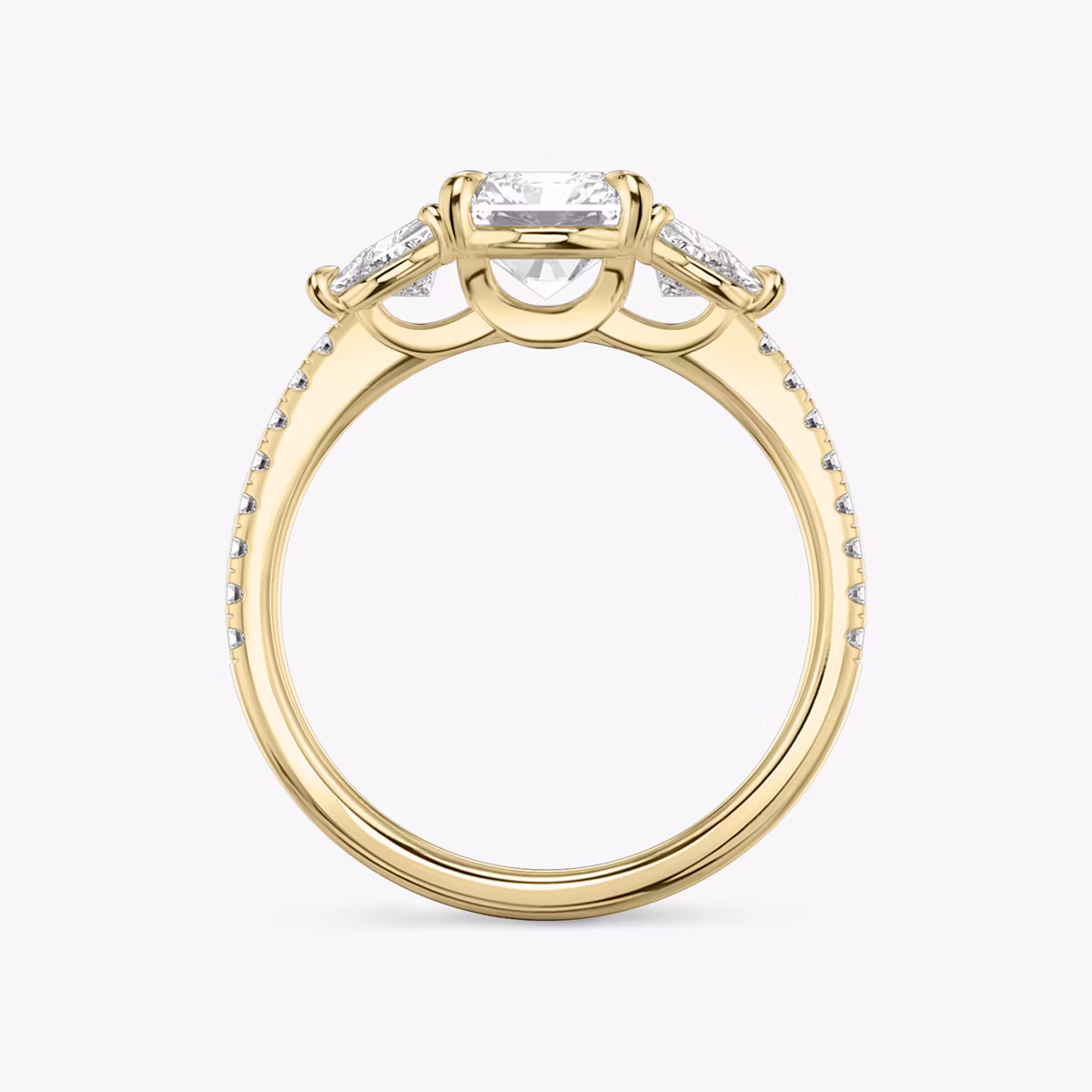 The Three Stone | Radiant | 18k | Yellow Gold | bandAccent: Pavé | sideStoneCarat: 0.25ct | sideStoneShape: Trillion | diamondOrientation: vertical | caratWeight: other