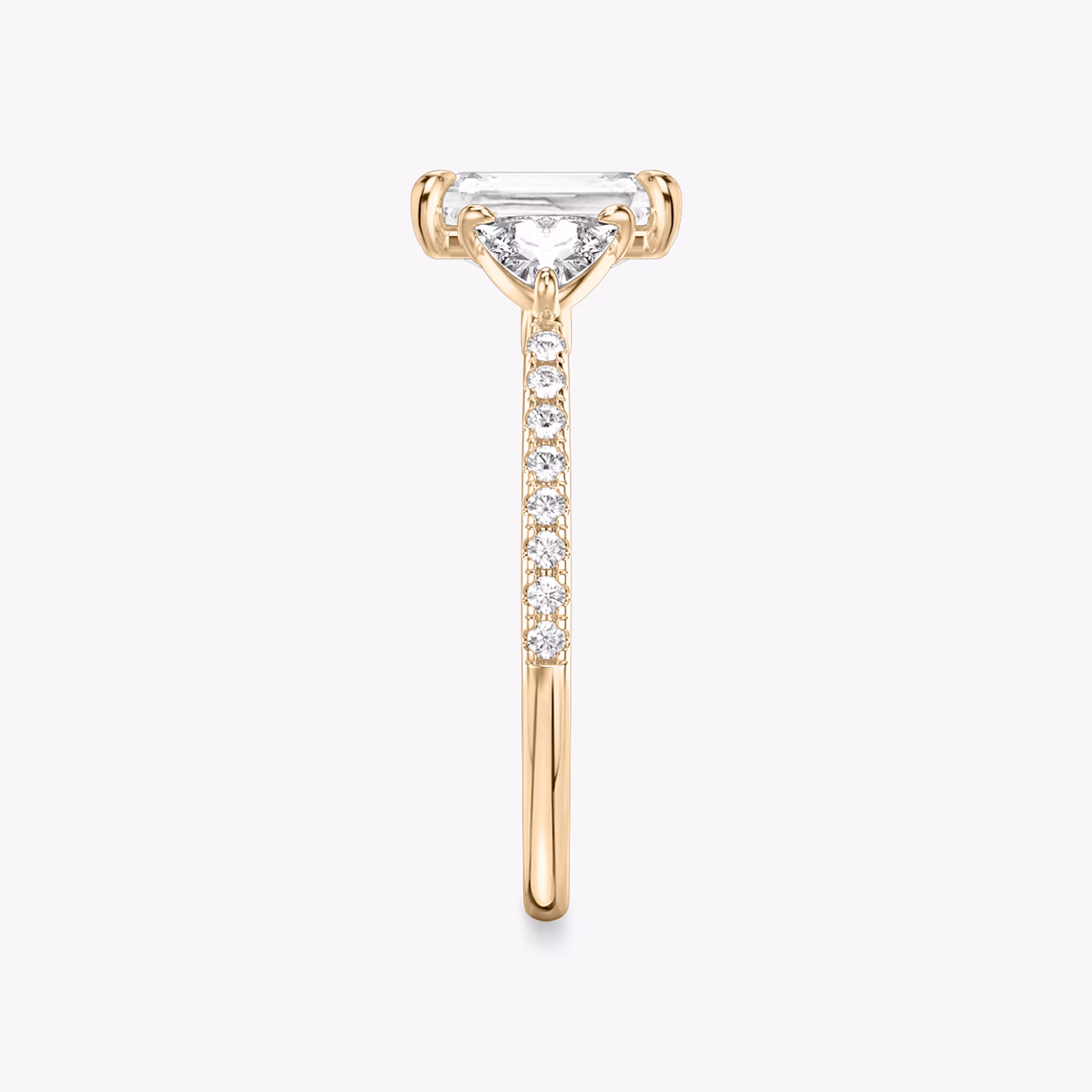The Three Stone | Radiant | 14k | Rose Gold | bandAccent: Pavé | sideStoneCarat: 0.25ct | sideStoneShape: Trillion | diamondOrientation: vertical | caratWeight: other