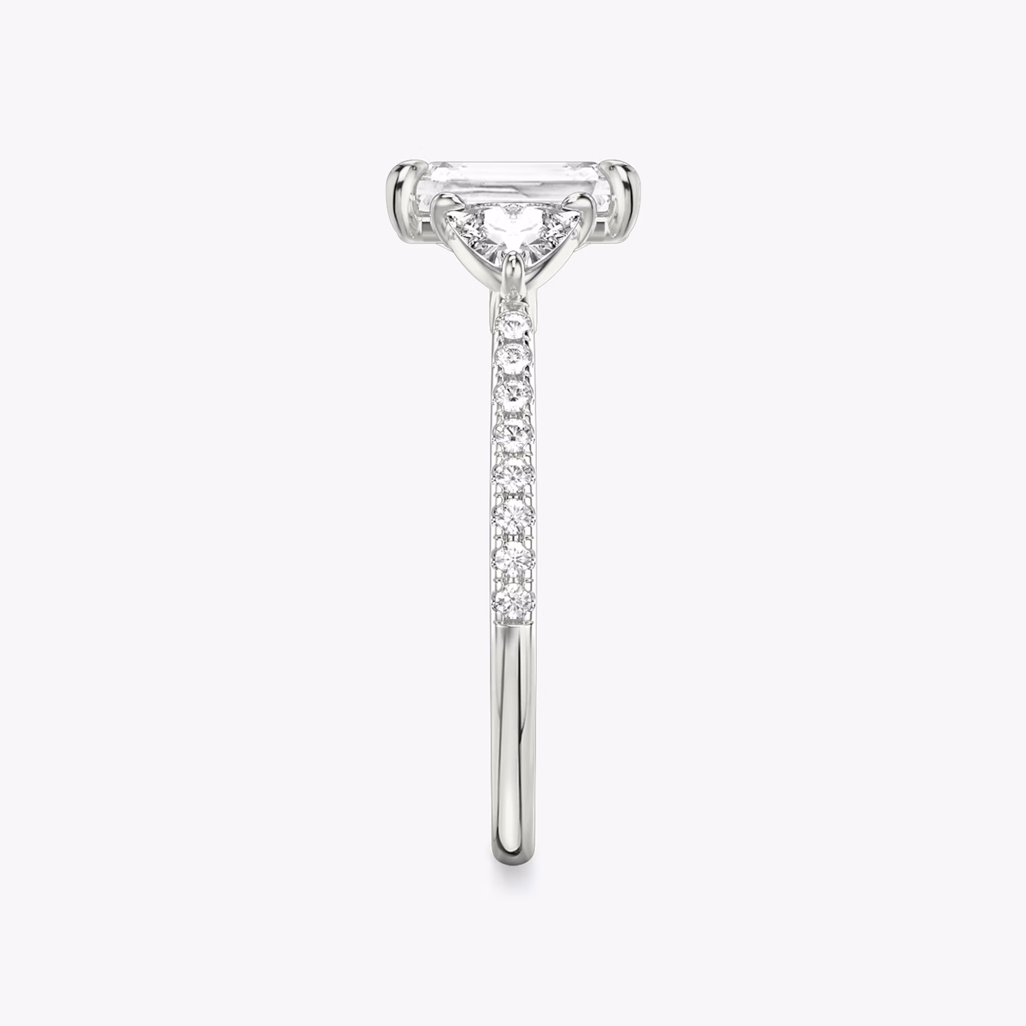 The Three Stone | Radiant | Platinum | bandAccent: Pavé | sideStoneCarat: 0.25ct | sideStoneShape: Trillion | diamondOrientation: vertical | caratWeight: other