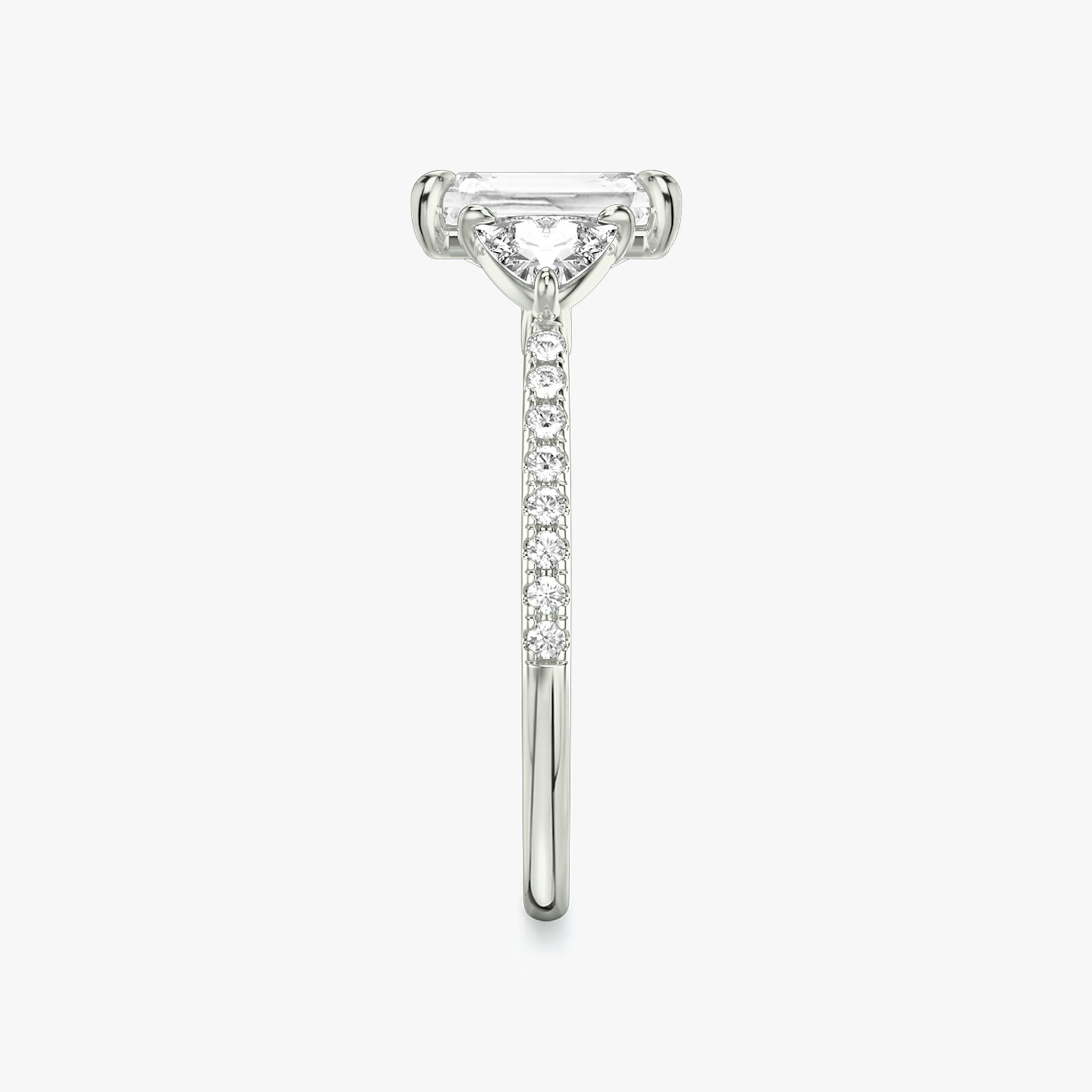The Three Stone | Radiant | Platinum | bandAccent: Pavé | sideStoneCarat: 0.25ct | sideStoneShape: Trillion | diamondOrientation: vertical | caratWeight: other