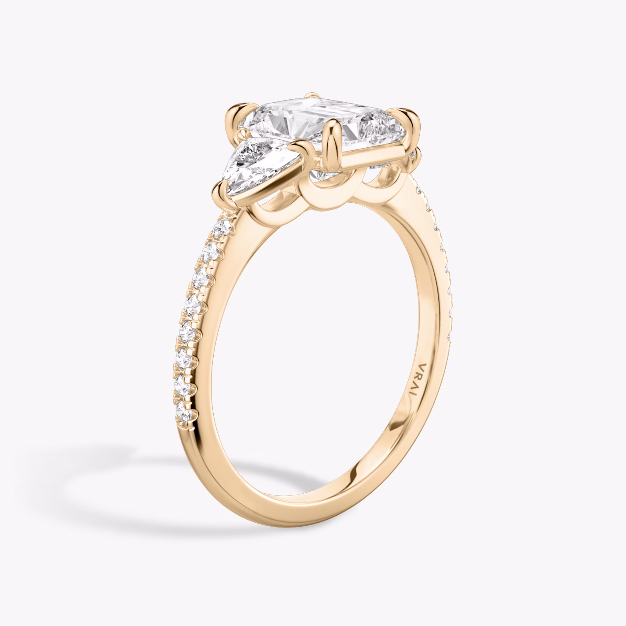 The Three Stone | Radiant | 14k | Rose Gold | bandAccent: Pavé | sideStoneCarat: 0.25ct | sideStoneShape: Trillion | diamondOrientation: vertical | caratWeight: other