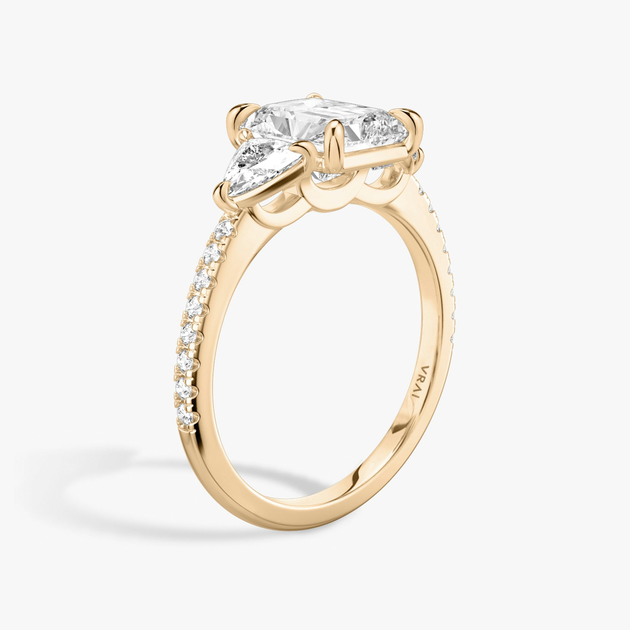 The Three Stone | Radiant | 14k | Rose Gold | bandAccent: Pavé | sideStoneCarat: 0.25ct | sideStoneShape: Trillion | diamondOrientation: vertical | caratWeight: other