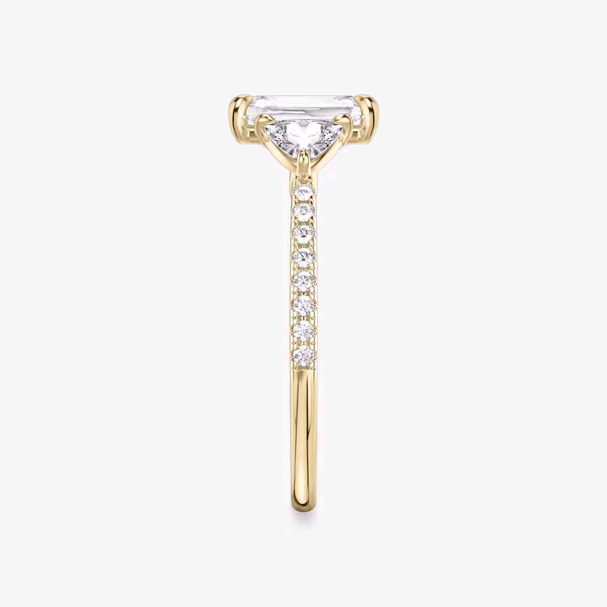 The Three Stone | Radiant | 18k | Yellow Gold | bandAccent: Pavé | sideStoneCarat: 0.25ct | sideStoneShape: Trillion | diamondOrientation: vertical | caratWeight: other