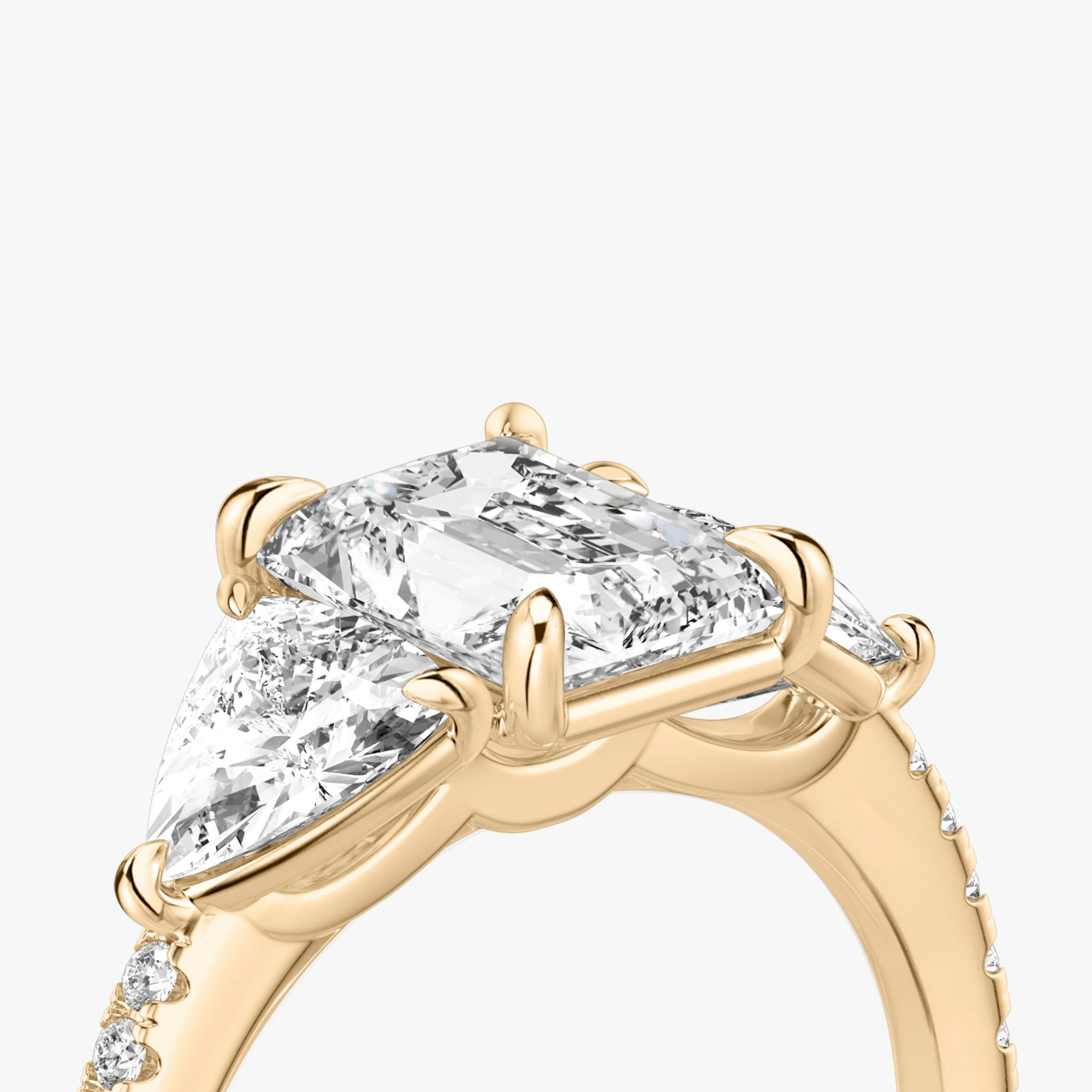 The Three Stone | Radiant | 14k | Rose Gold | bandAccent: Pavé | sideStoneCarat: 0.50ct | sideStoneShape: Trillion | diamondOrientation: vertical | caratWeight: other