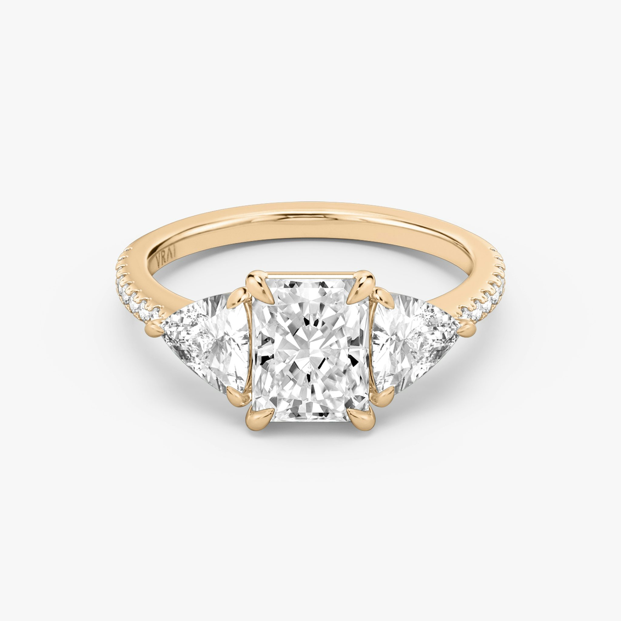 The Three Stone | Radiant | 14k | Rose Gold | bandAccent: Pavé | sideStoneCarat: 0.50ct | sideStoneShape: Trillion | diamondOrientation: vertical | caratWeight: other