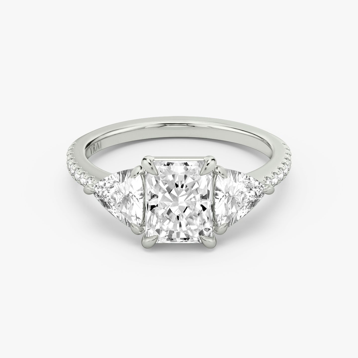 The Three Stone | Radiant | Platinum | bandAccent: Pavé | sideStoneCarat: 0.50ct | sideStoneShape: Trillion | diamondOrientation: vertical | caratWeight: other
