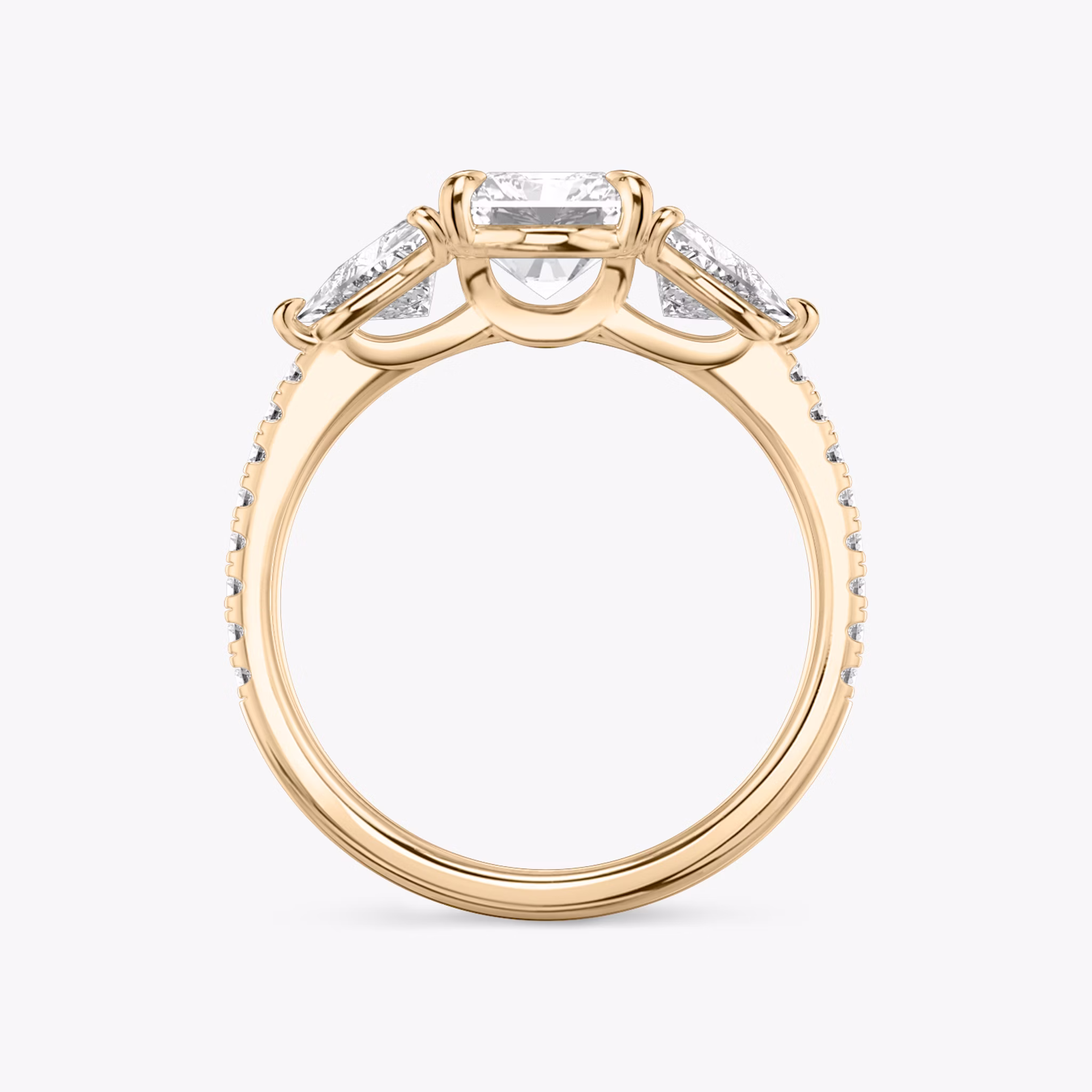 The Three Stone | Radiant | 14k | Rose Gold | bandAccent: Pavé | sideStoneCarat: 0.50ct | sideStoneShape: Trillion | diamondOrientation: vertical | caratWeight: other