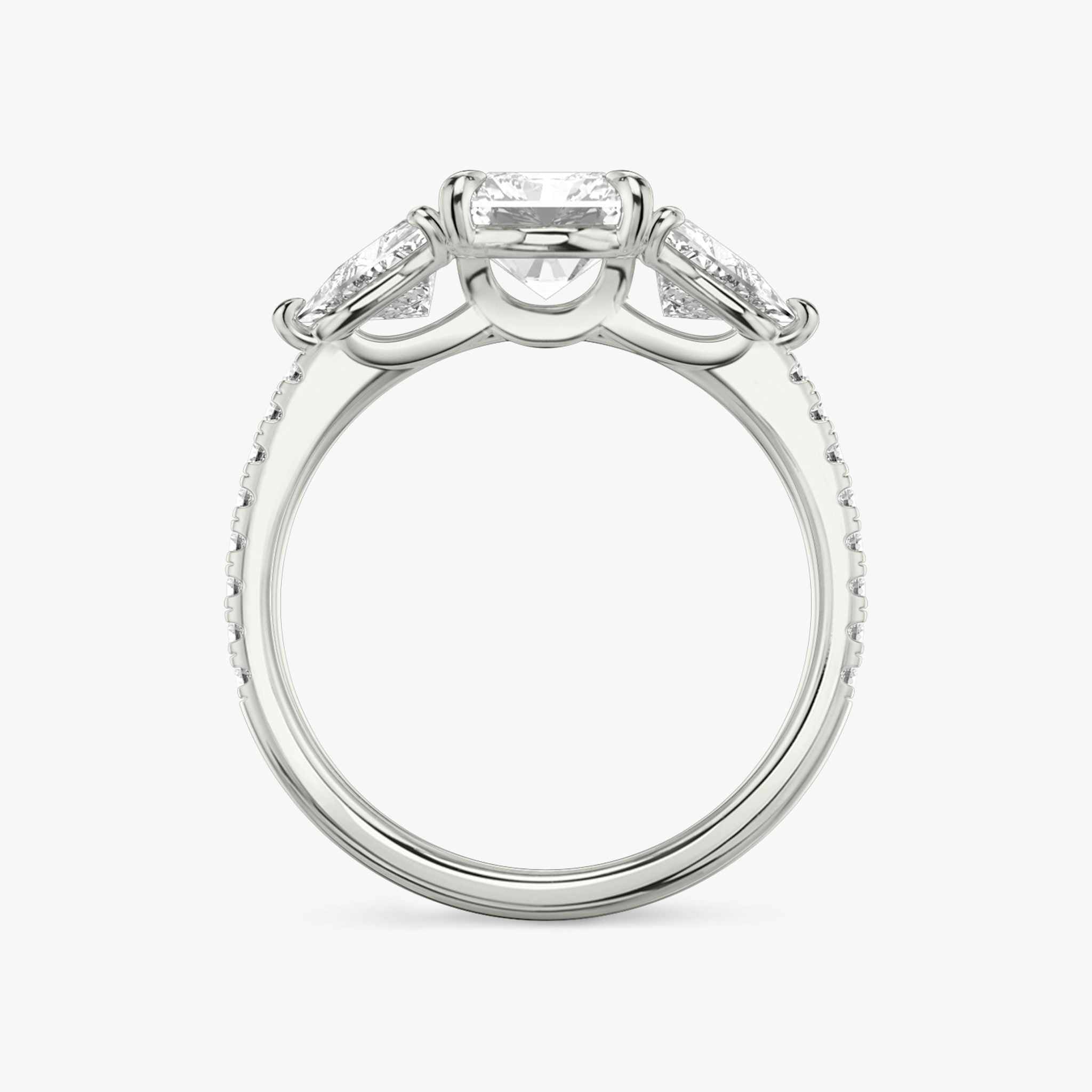 The Three Stone | Radiant | 18k | White Gold | bandAccent: Pavé | sideStoneCarat: 0.50ct | sideStoneShape: Trillion | diamondOrientation: vertical | caratWeight: other