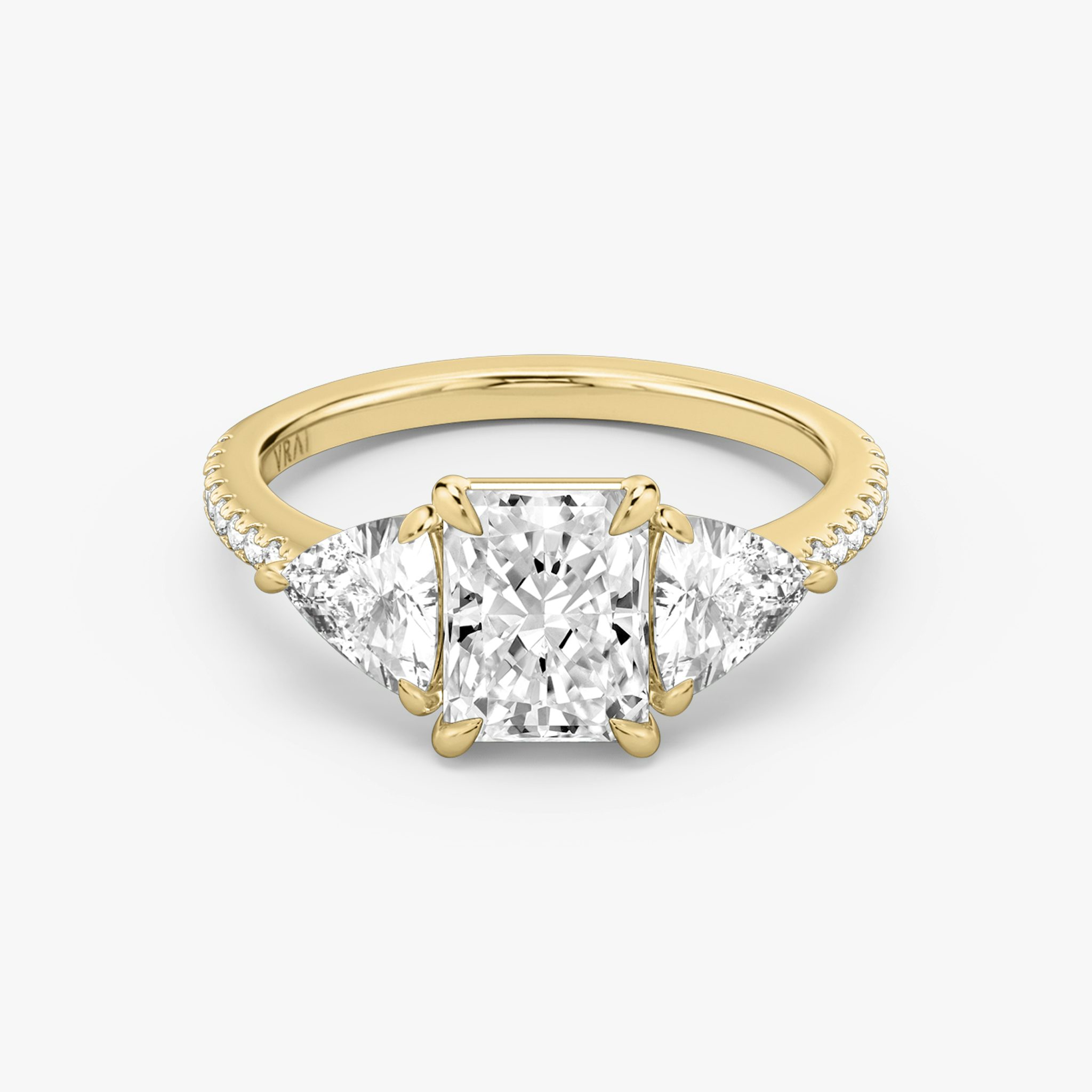 The Three Stone | Radiant | 18k | Yellow Gold | bandAccent: Pavé | sideStoneCarat: 0.50ct | sideStoneShape: Trillion | diamondOrientation: vertical | caratWeight: other