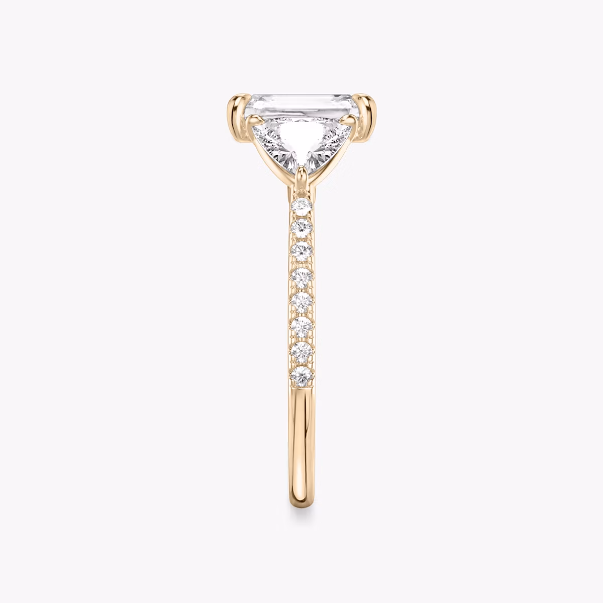 The Three Stone | Radiant | 14k | Rose Gold | bandAccent: Pavé | sideStoneCarat: 0.50ct | sideStoneShape: Trillion | diamondOrientation: vertical | caratWeight: other