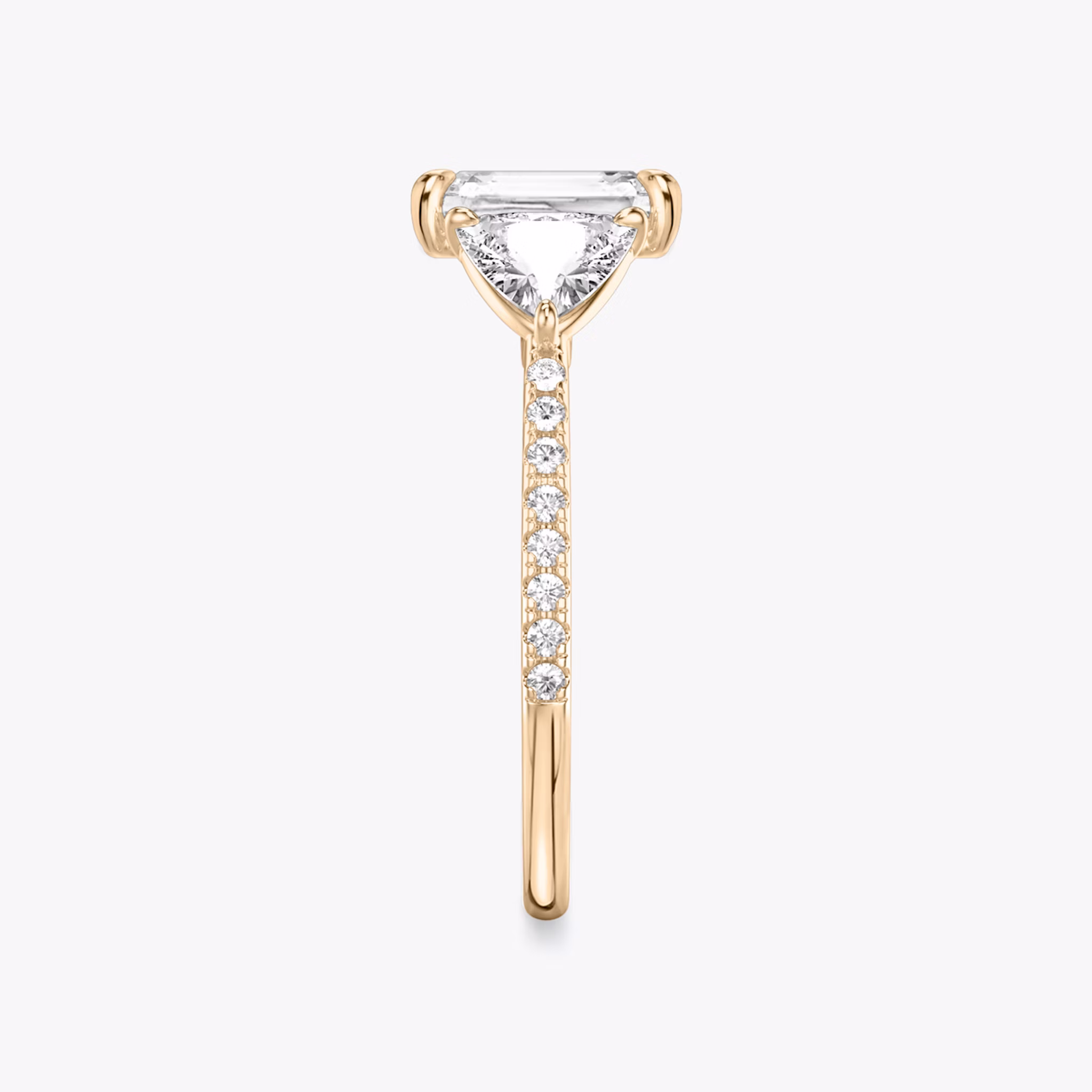 The Three Stone | Radiant | 14k | Rose Gold | bandAccent: Pavé | sideStoneCarat: 0.50ct | sideStoneShape: Trillion | diamondOrientation: vertical | caratWeight: other