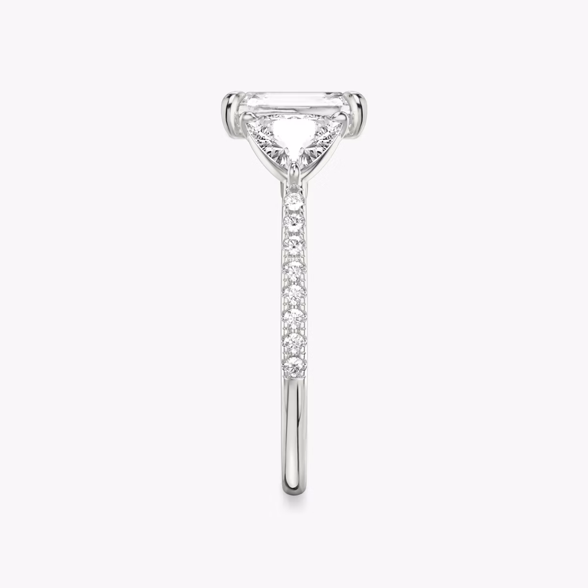 The Three Stone | Radiant | Platinum | bandAccent: Pavé | sideStoneCarat: 0.50ct | sideStoneShape: Trillion | diamondOrientation: vertical | caratWeight: other