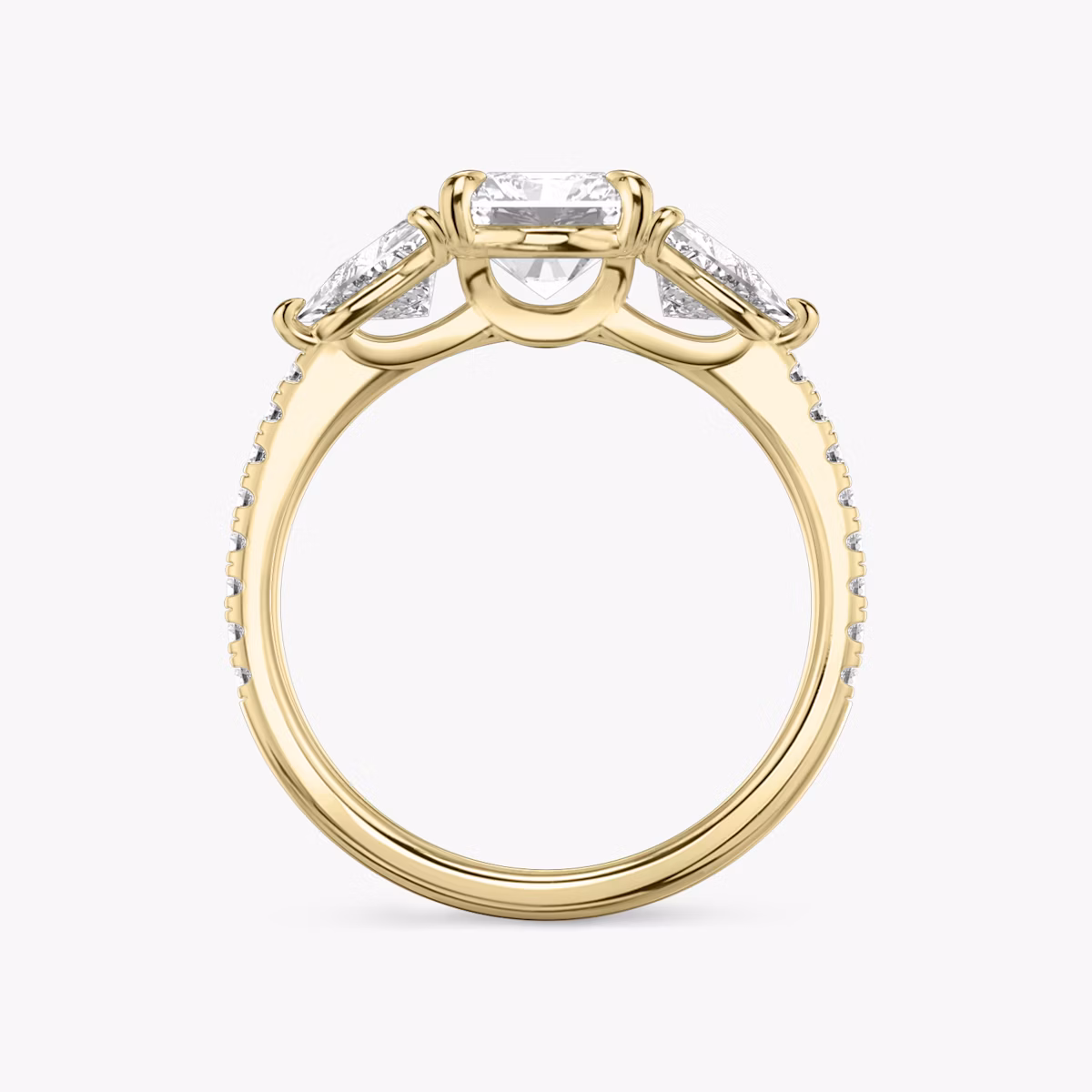 The Three Stone | Radiant | 18k | Yellow Gold | bandAccent: Pavé | sideStoneCarat: 0.50ct | sideStoneShape: Trillion | diamondOrientation: vertical | caratWeight: other