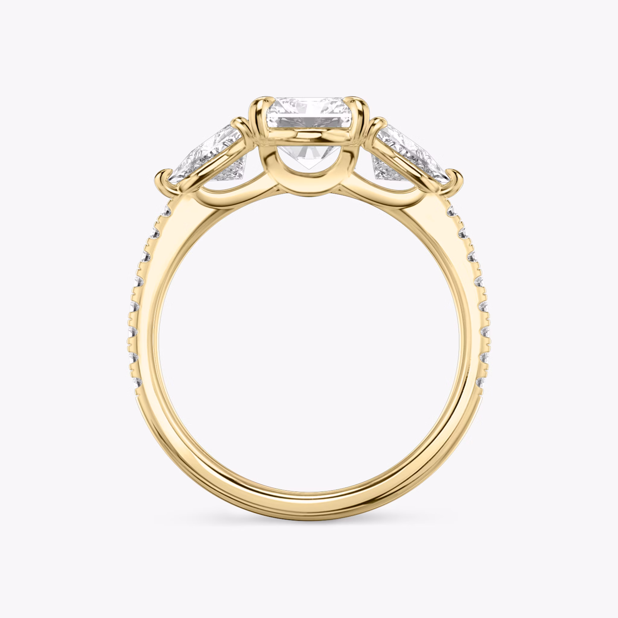 The Three Stone | Radiant | 18k | Yellow Gold | bandAccent: Pavé | sideStoneCarat: 0.50ct | sideStoneShape: Trillion | diamondOrientation: vertical | caratWeight: other