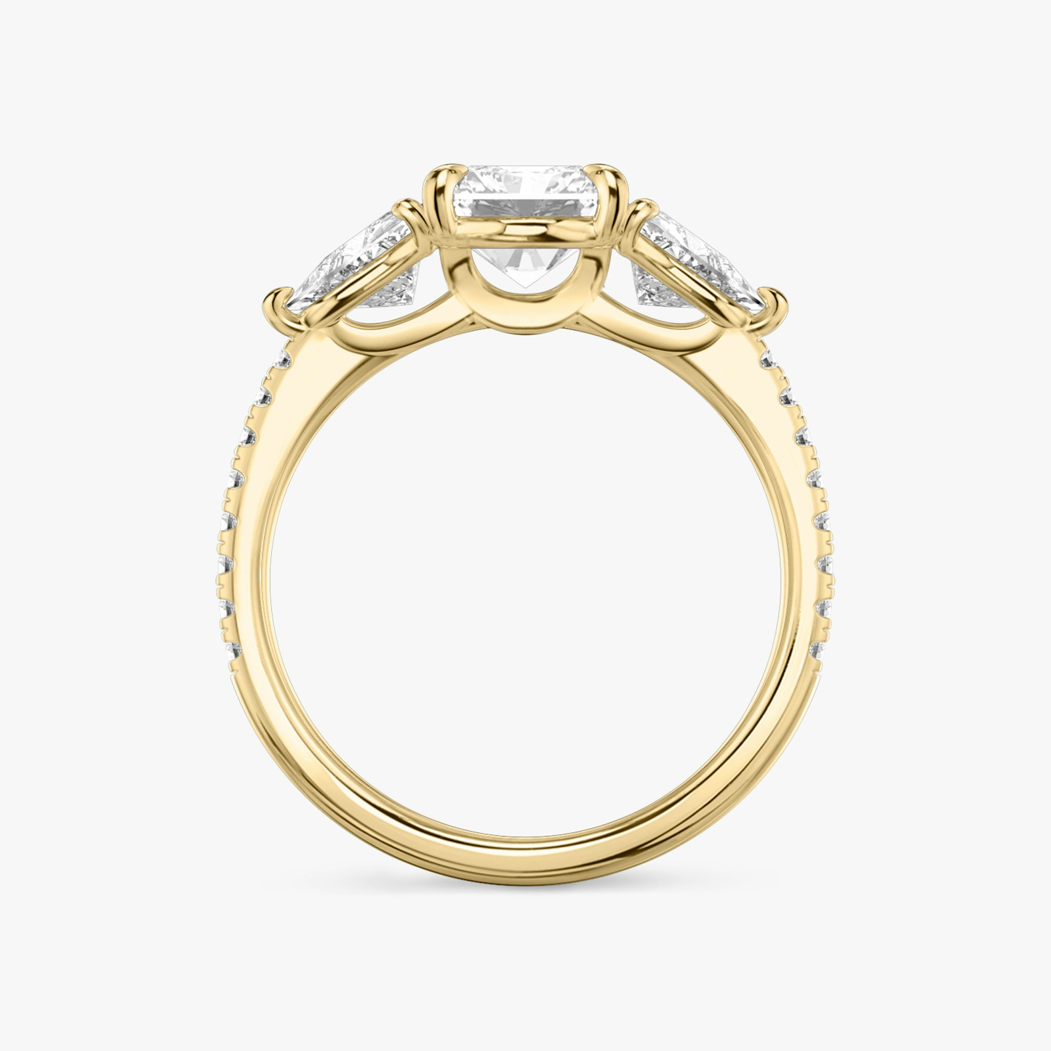 The Three Stone | Radiant | 18k | Yellow Gold | bandAccent: Pavé | sideStoneCarat: 0.50ct | sideStoneShape: Trillion | diamondOrientation: vertical | caratWeight: other