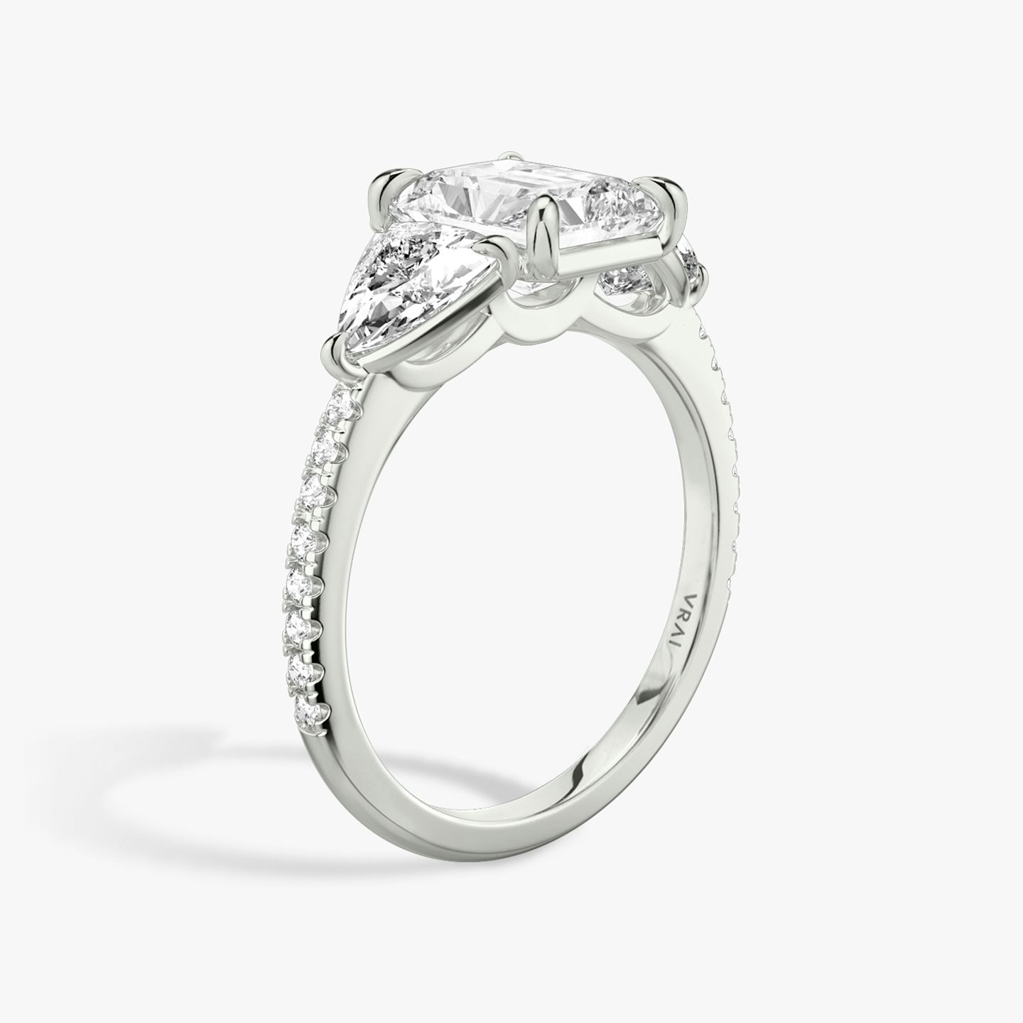 The Three Stone | Radiant | Platinum | bandAccent: Pavé | sideStoneCarat: 0.50ct | sideStoneShape: Trillion | diamondOrientation: vertical | caratWeight: other