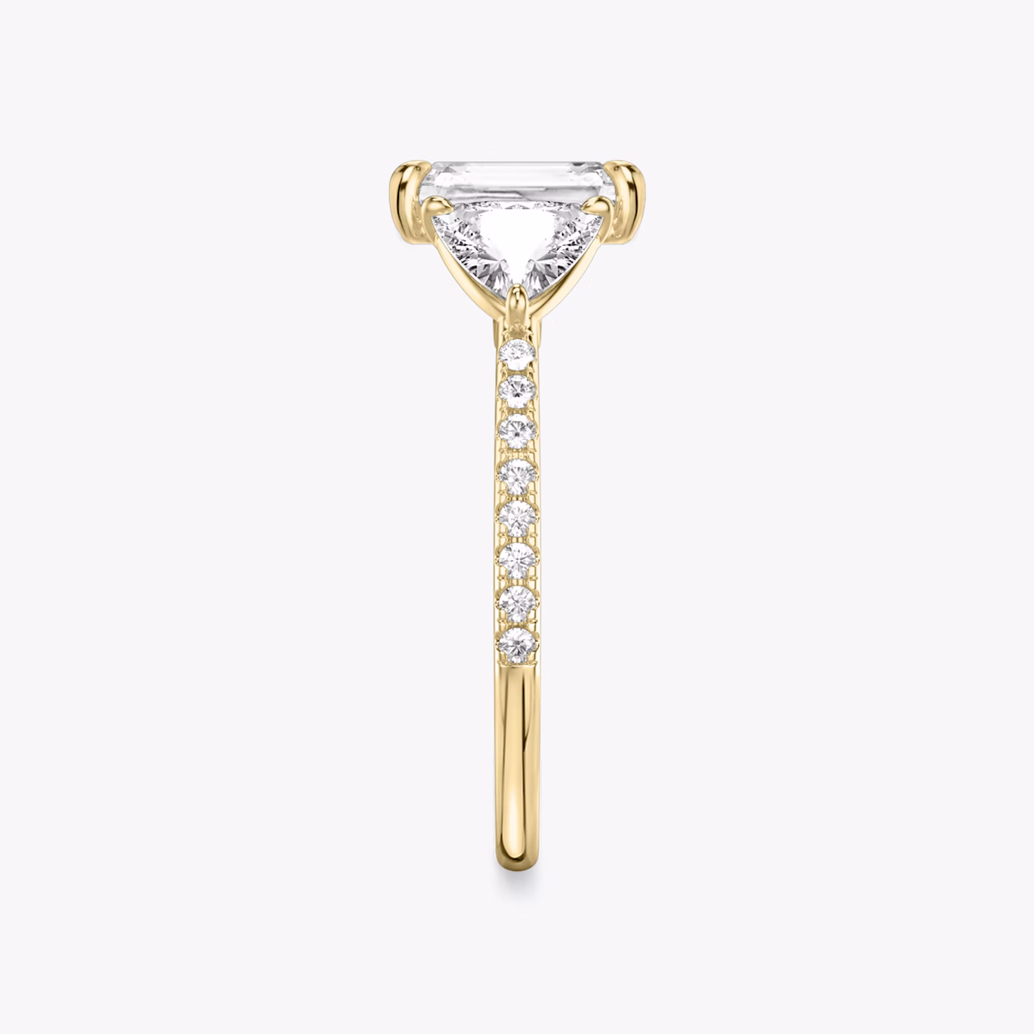 The Three Stone | Radiant | 18k | Yellow Gold | bandAccent: Pavé | sideStoneCarat: 0.50ct | sideStoneShape: Trillion | diamondOrientation: vertical | caratWeight: other