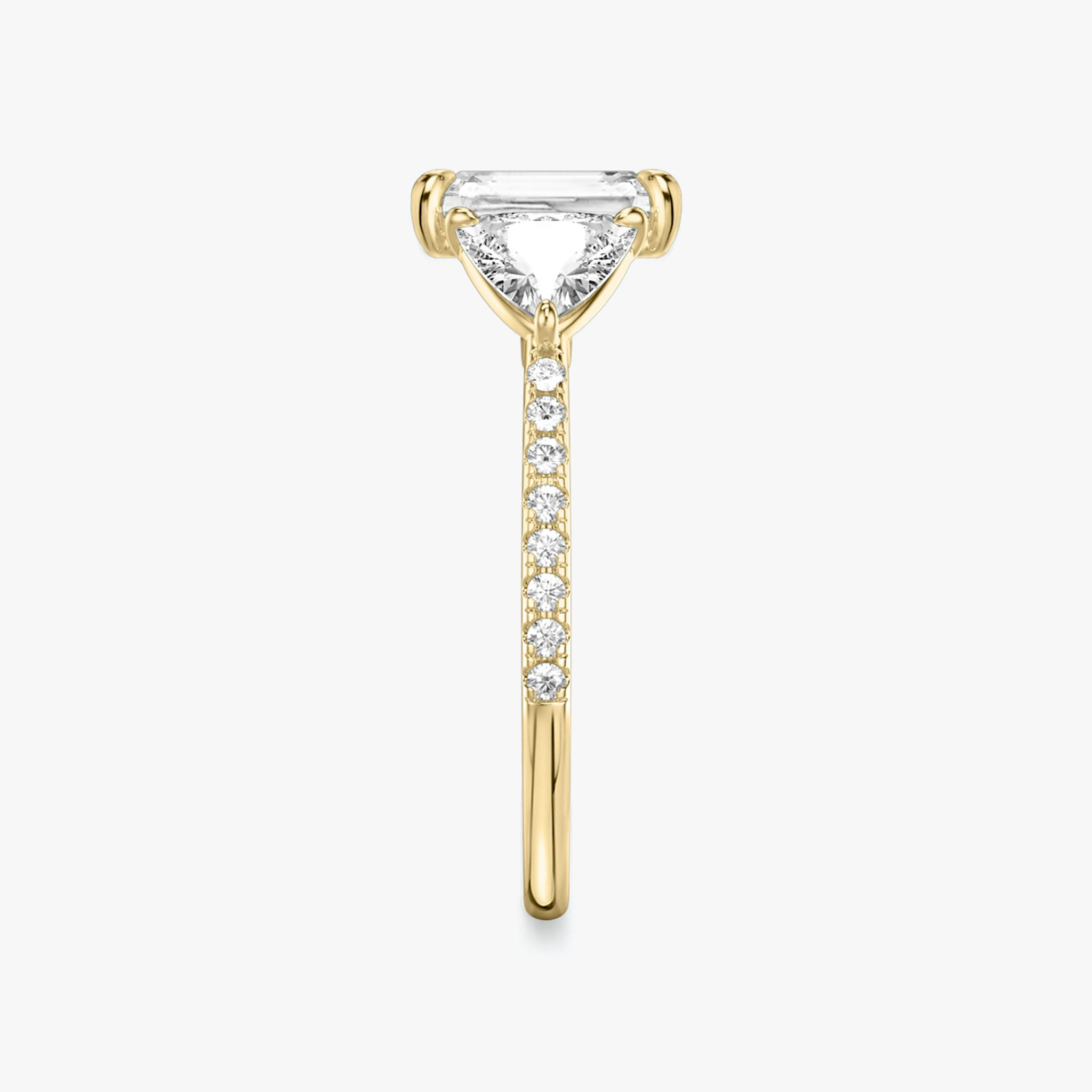 The Three Stone | Radiant | 18k | Yellow Gold | bandAccent: Pavé | sideStoneCarat: 0.50ct | sideStoneShape: Trillion | diamondOrientation: vertical | caratWeight: other