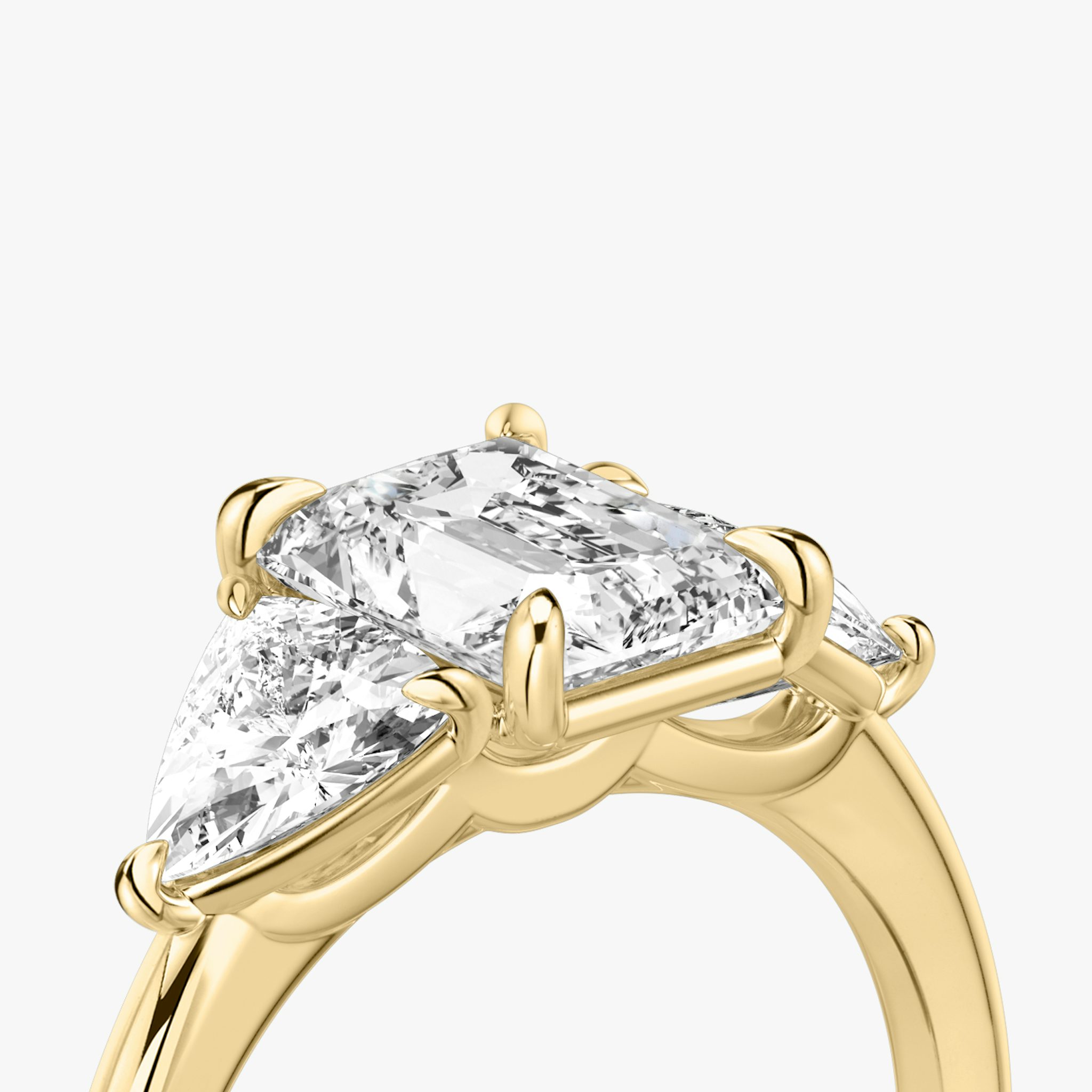 The Three Stone | Radiant | 18k | Yellow Gold | bandAccent: Plain | sideStoneCarat: 0.50ct | sideStoneShape: Trillion | diamondOrientation: vertical | caratWeight: other